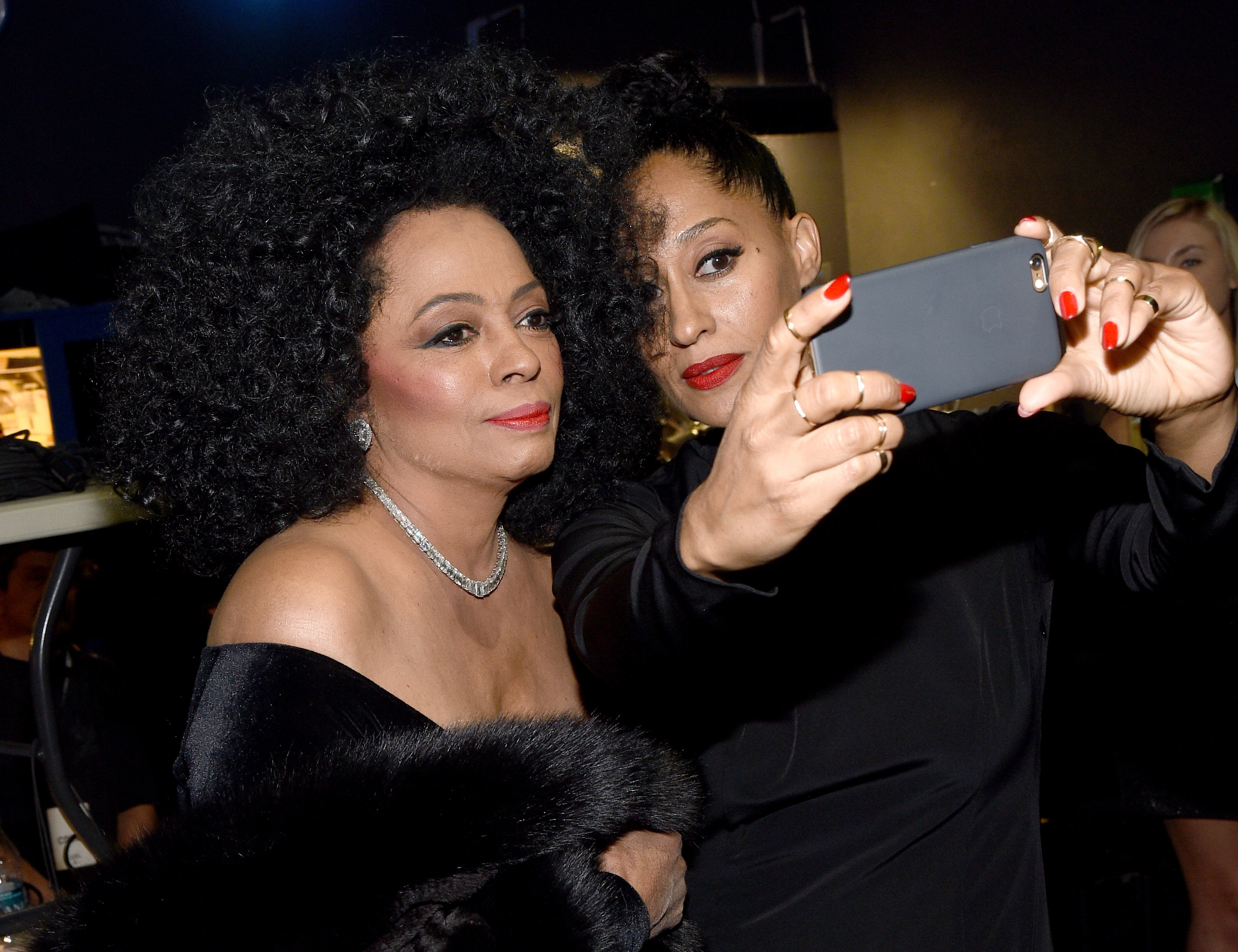 Diana Ross and Tracee Ellis Ross posing for a selfie at an awards show.
