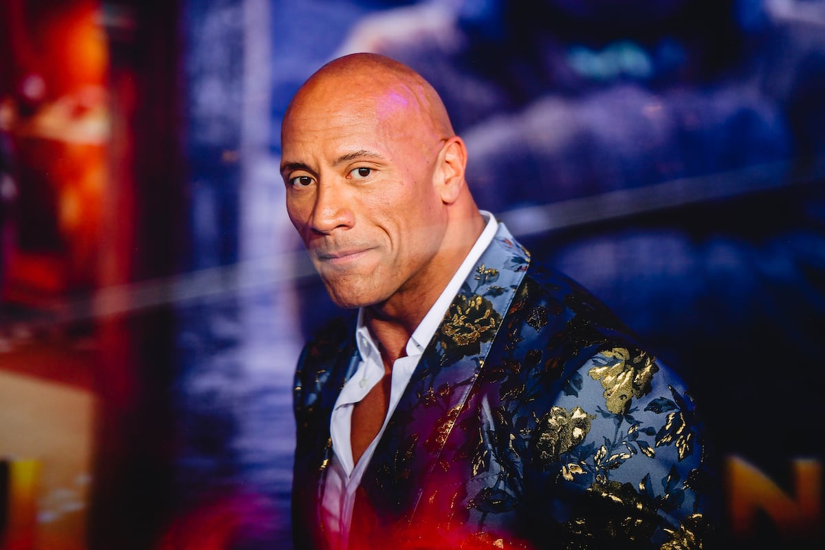 Dwayne Johnson in colorful suit. 