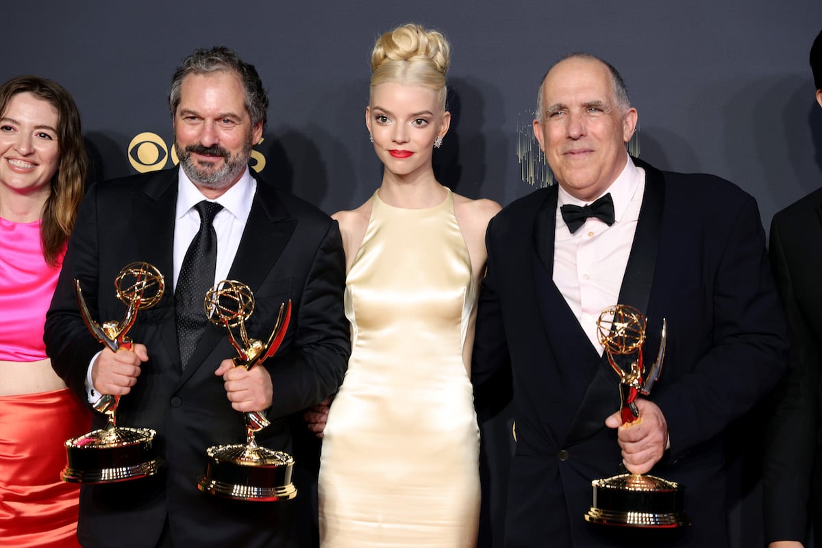Anya Taylor-Joy posing with Marielle Heller, Scott Frank, and William Horberg at the 73rd annual Emmy Awards.