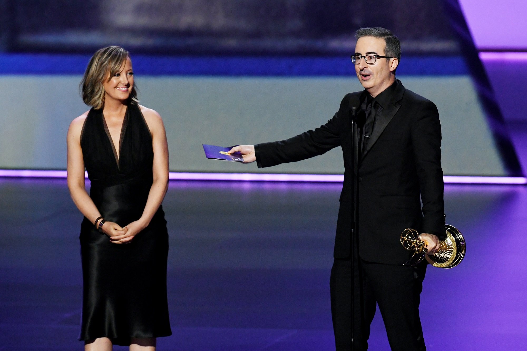 2021 Emmy predictions Last Week Tonight with John Oliver, whose host is pictured here in a black tuxedo at last year's Emmy Awards