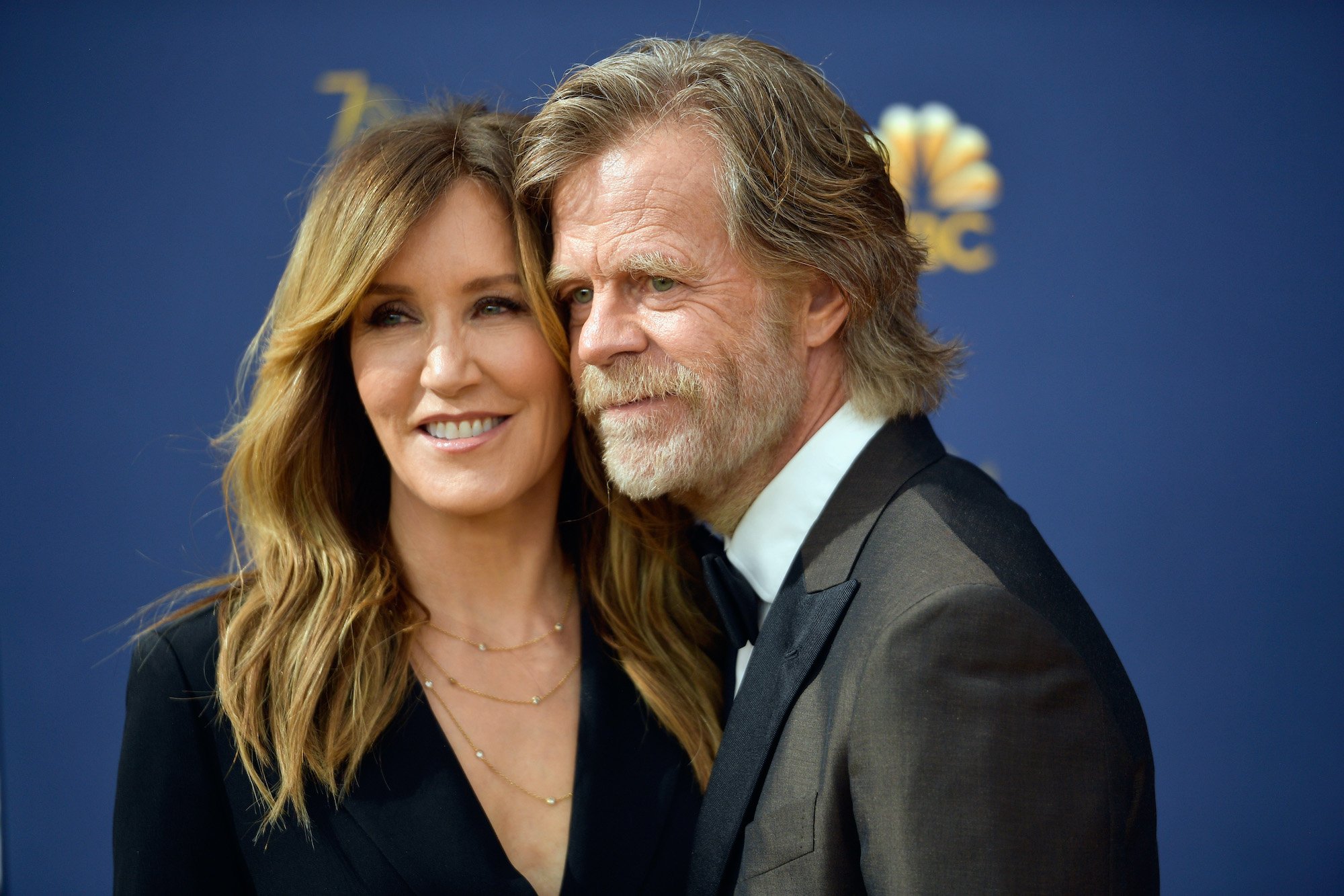 Felicity Huffman and William H. Macy, two Emmy Awards winners, pose at the 2018 Emmys red carpet