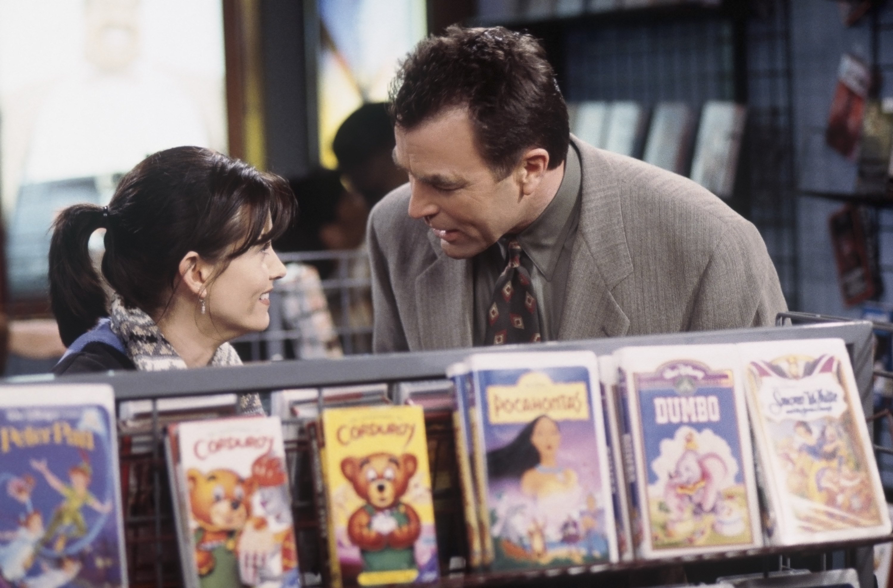 Monica Geller runs into Richard Burke after their breakup in the video rental store