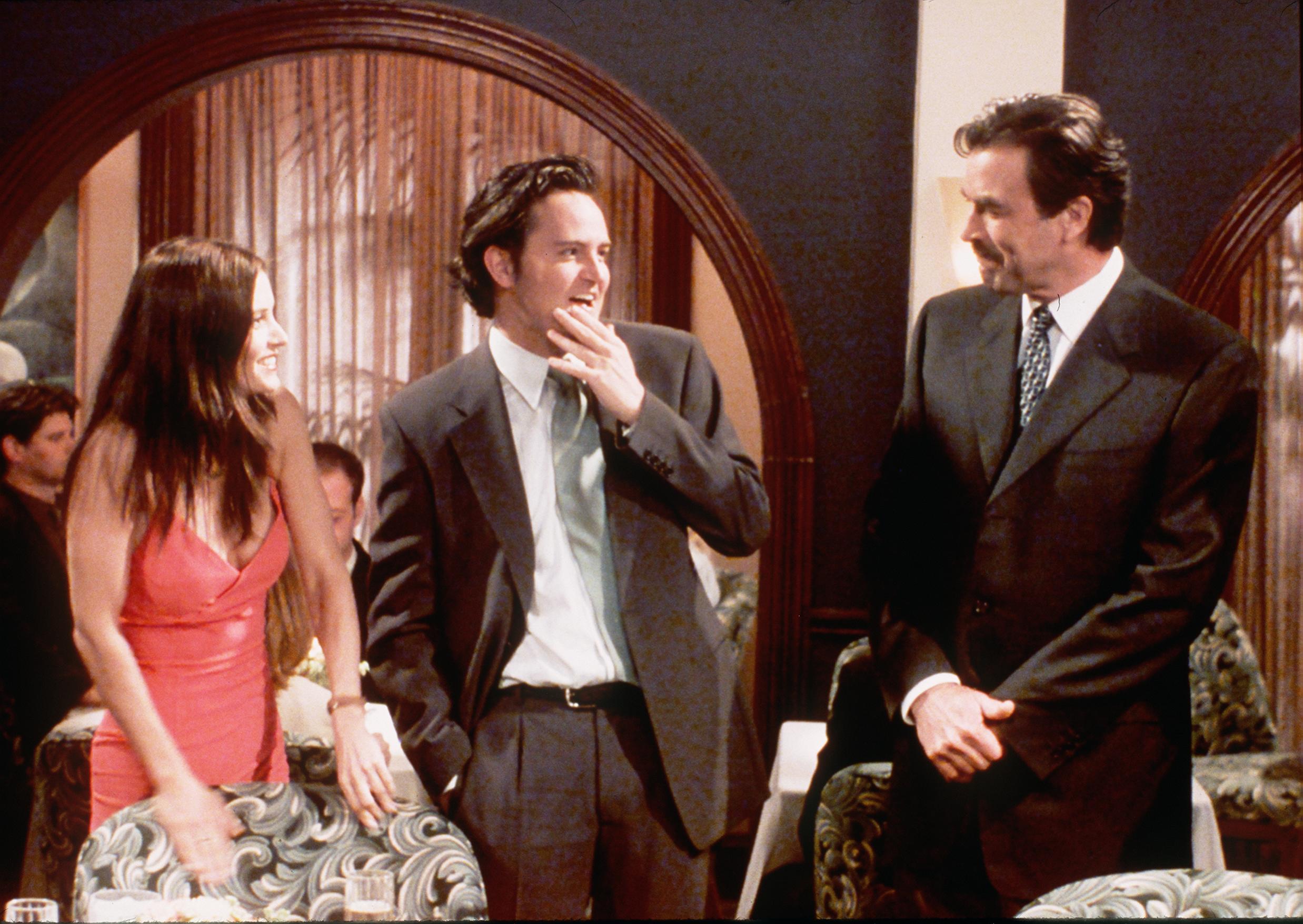 Monica and Chandler chat with Dr. Richard Burke in "The One With the Proposal" episode of 'Friends'
