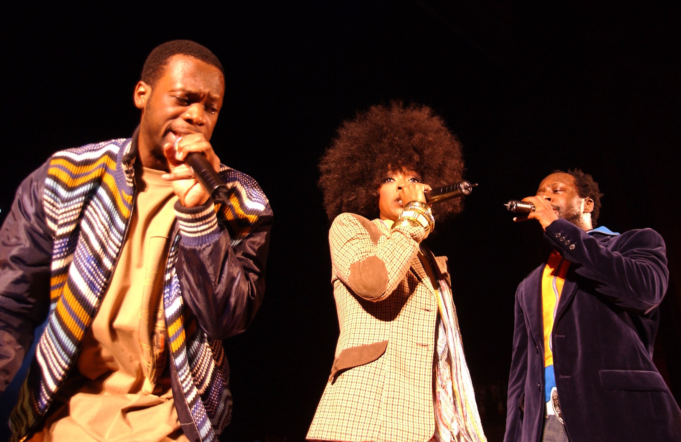 The Fugees performing in the 1990s