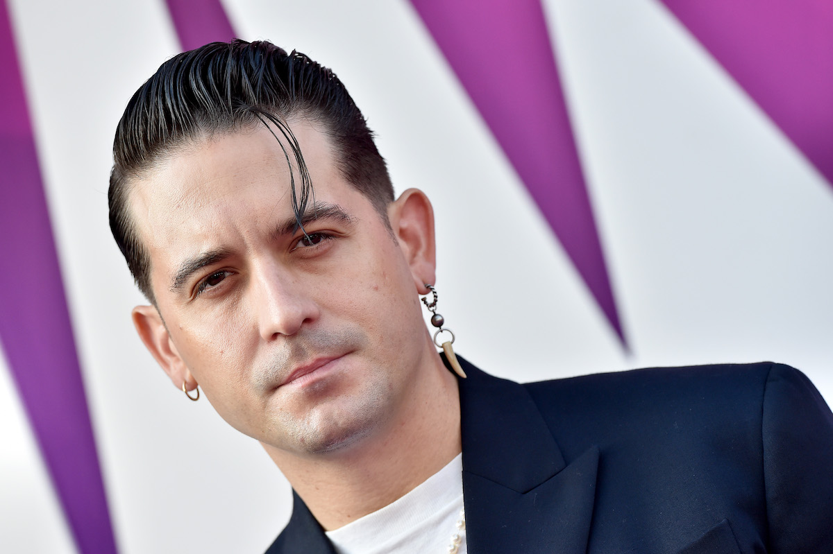 Close-up of G-Eazy's face at an event.