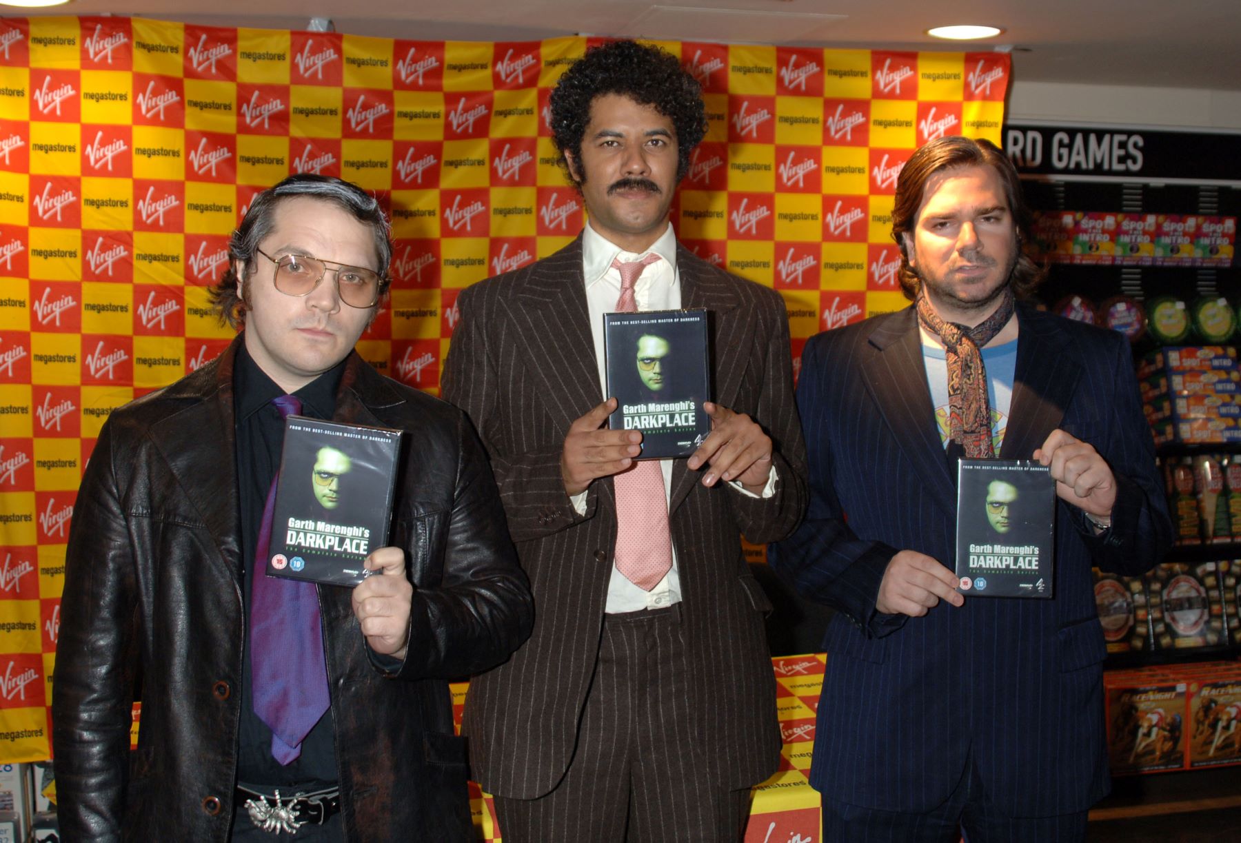The cast of 'Garth Marenghi's Dark Place' signing DVD copies in London