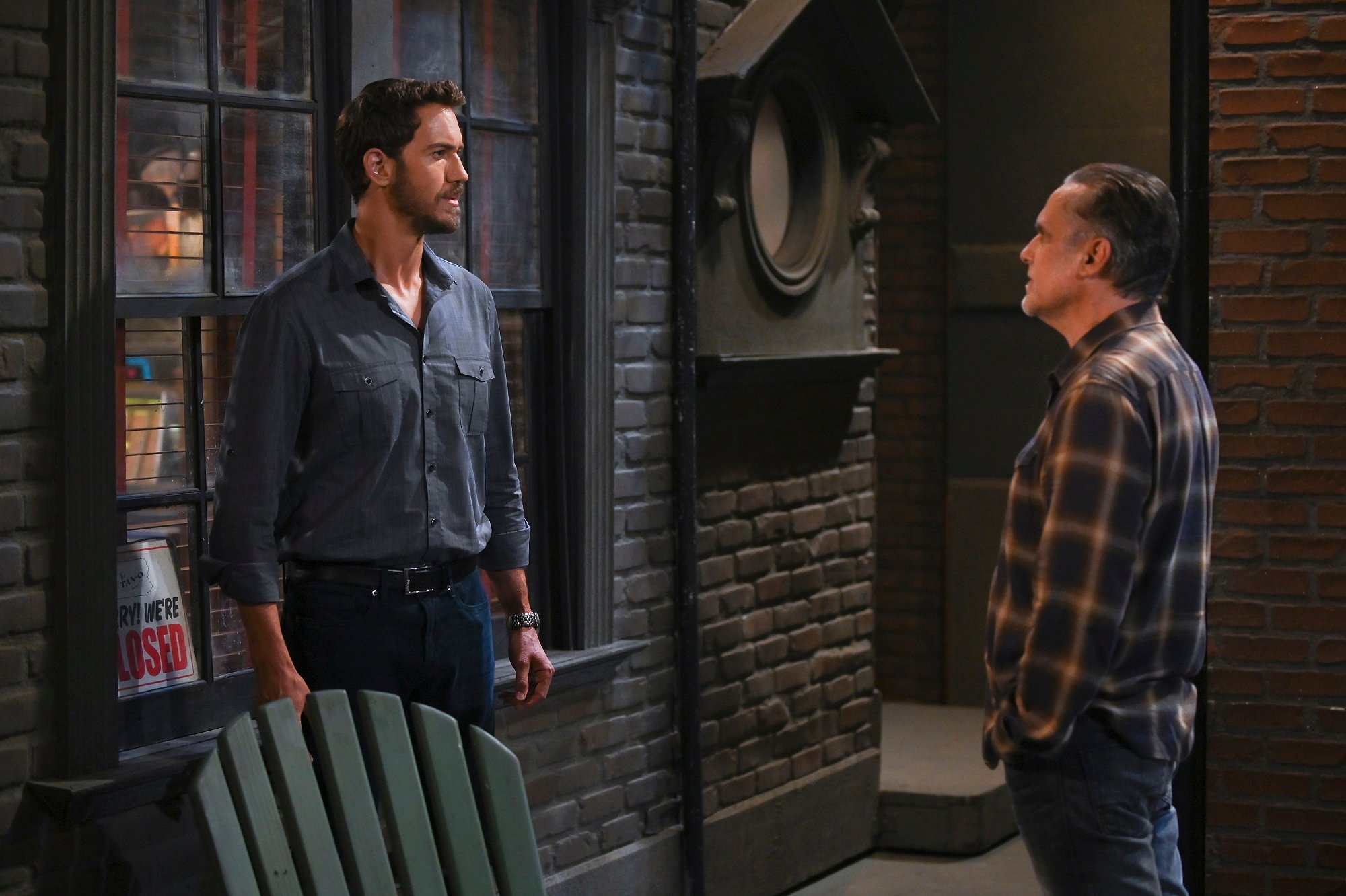 General Hospital speculation focuses on Peter, pictured here in a bar wearing a blue buttoned-down shirt