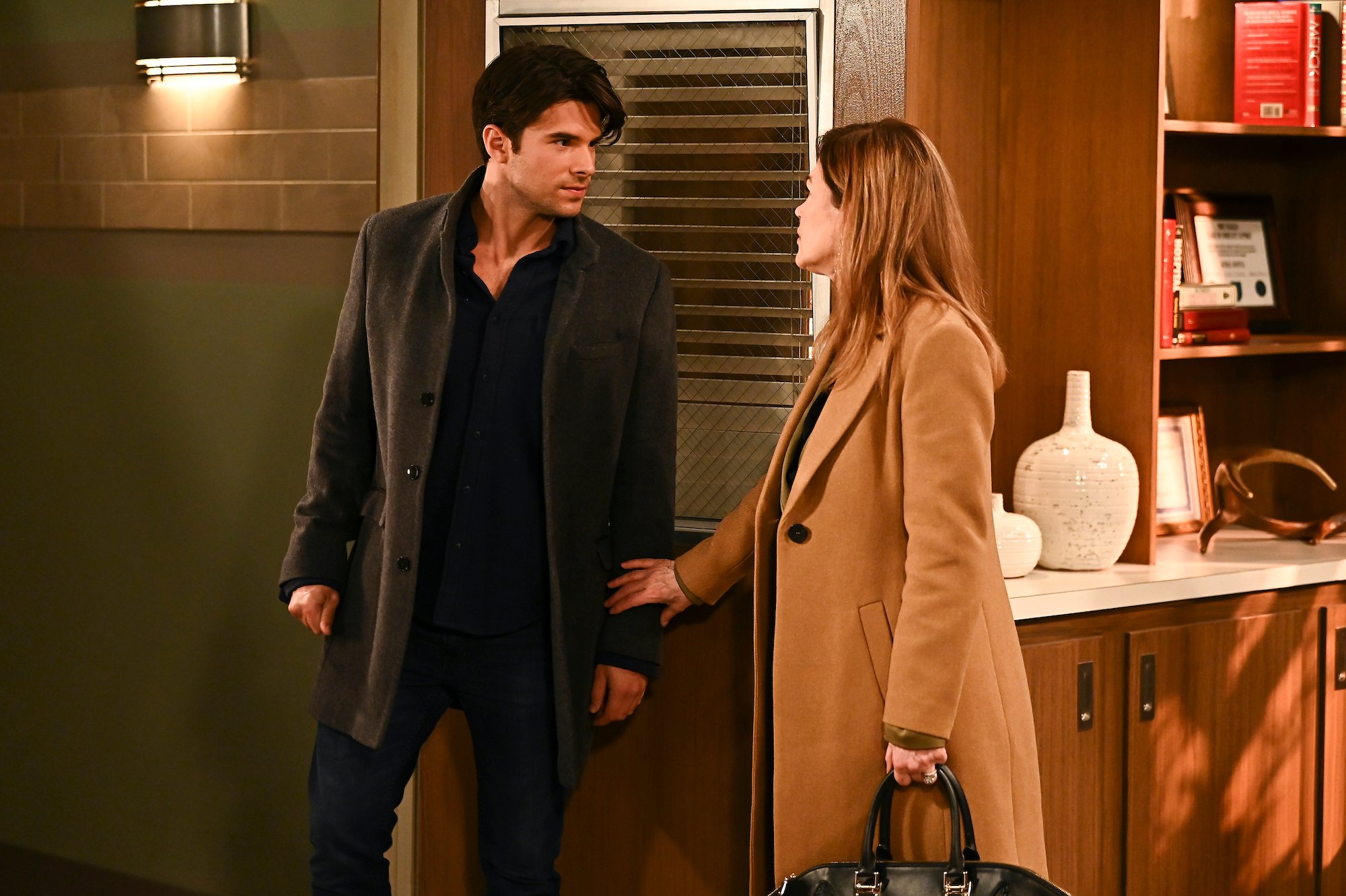 Josh Swickard on 'General Hospital', standing in a doorway