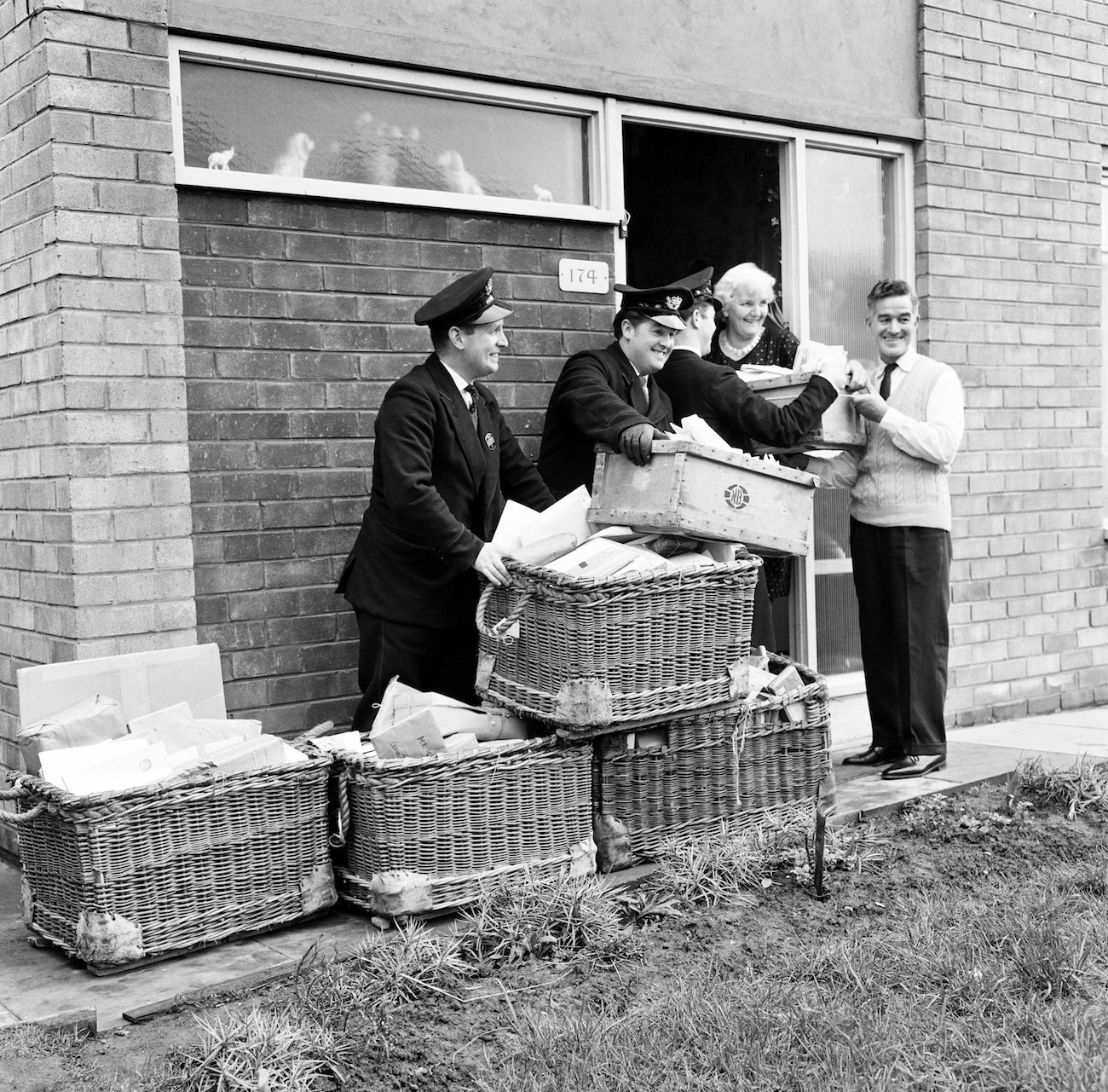 George Harrison's parents accepting fan mail for George's 21st birthday in 1964. 