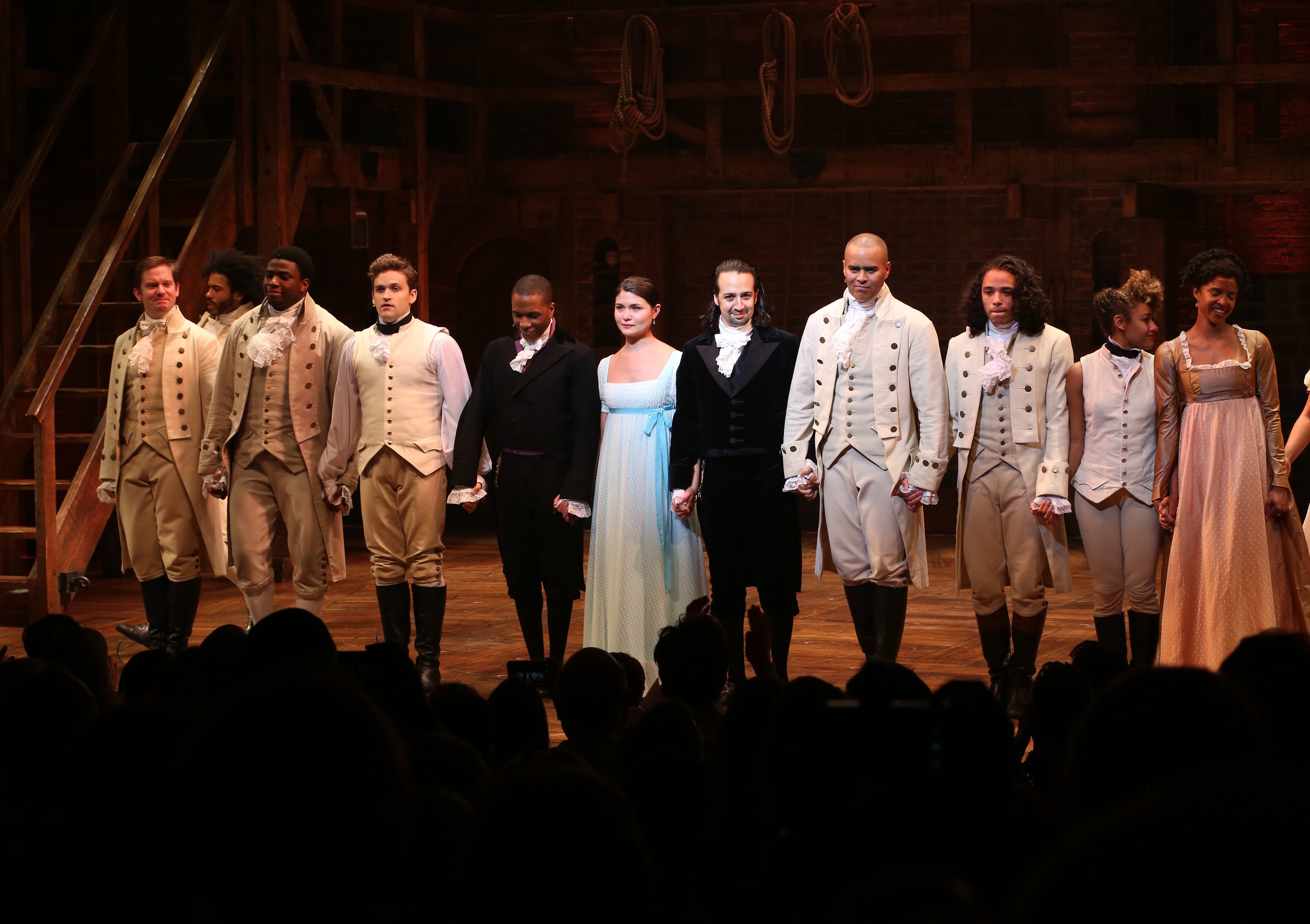 Leslie Odom Jr., Phillipa Soo, and Ariana DeBose with Lin-Manuel Miranda with the cast during their final performance curtain call of 'Hamilton'
