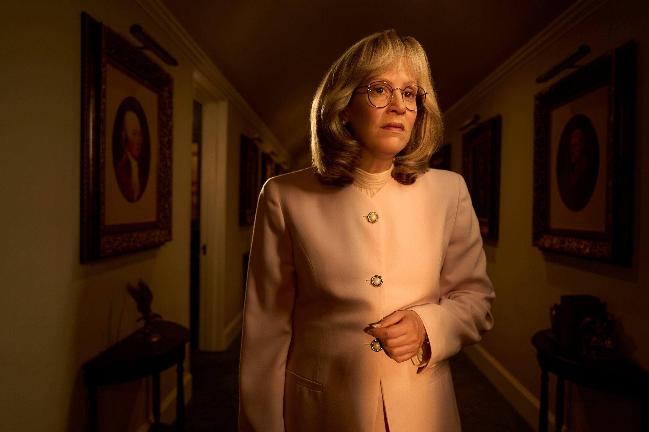 Impeachment: American Crime Story -- Linda Tripp stands in the White House hall