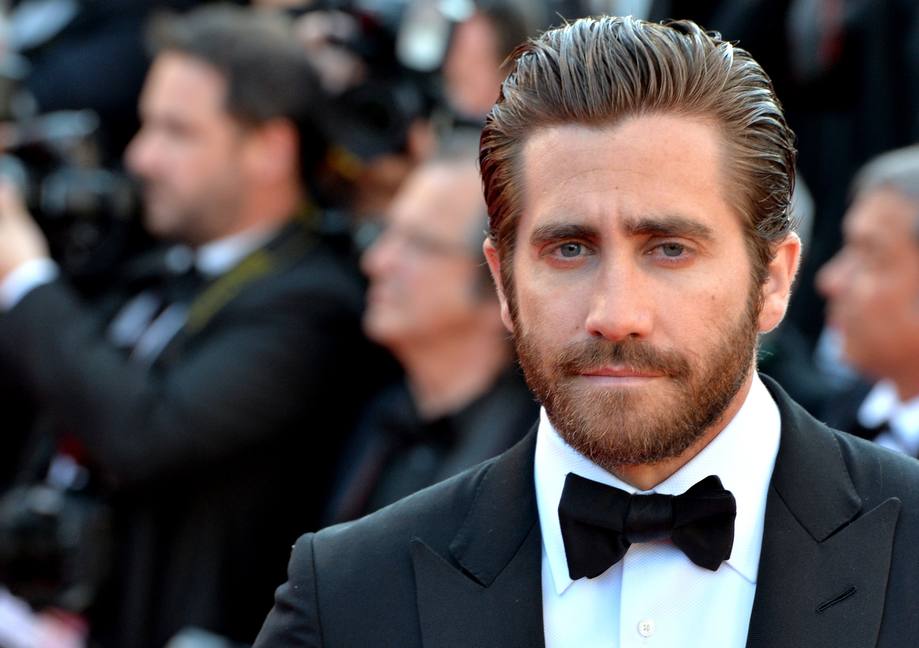 Jake Gyllenhaal, who almost had the rights to a Leonard Bernstein biopic, poses in a tuxedo