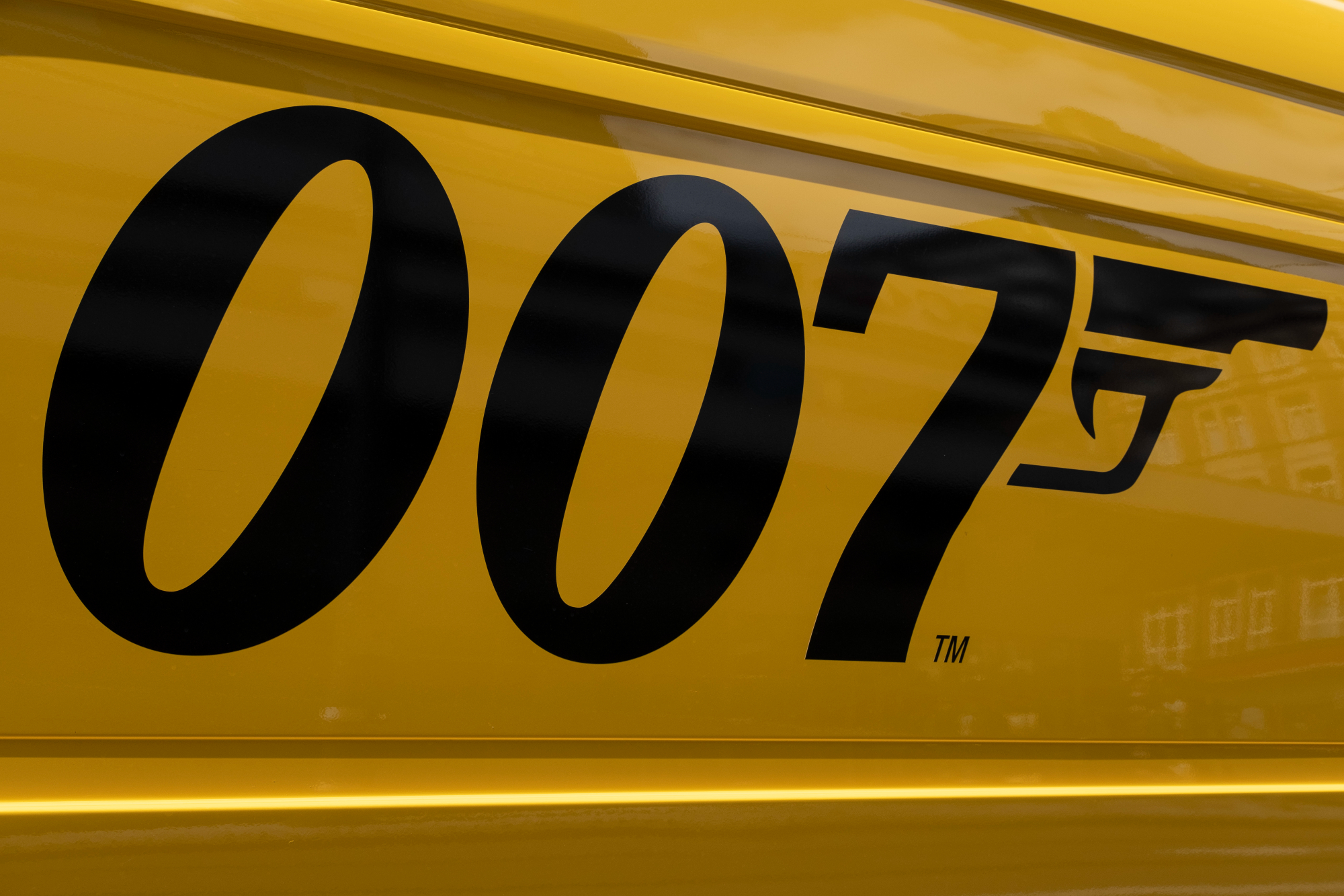 James Bond 007 logo on the side of a DHL delivery van