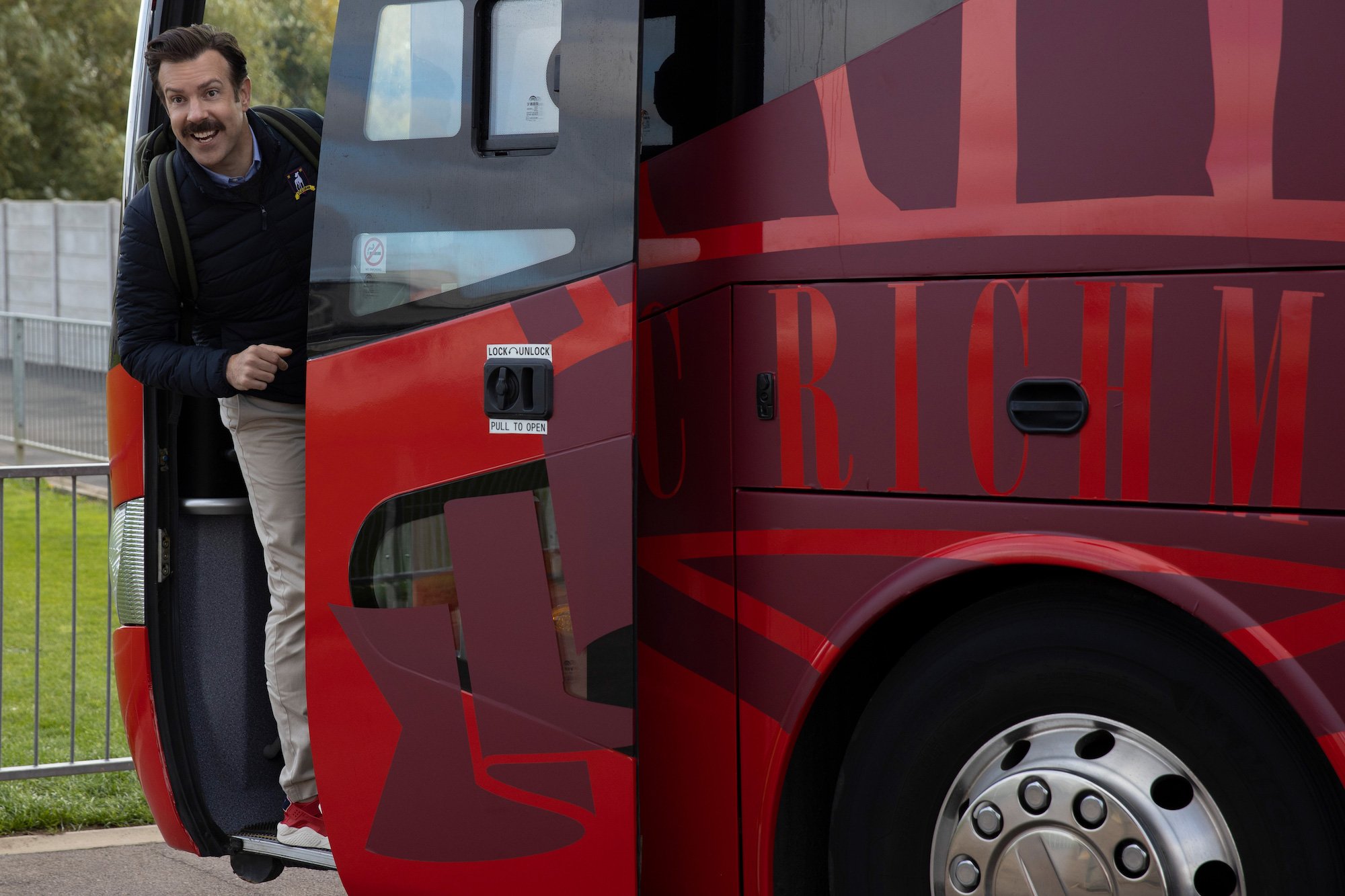 Ted Lasso, played by Jason Sudeikis, aboard the AFC Richmond bus