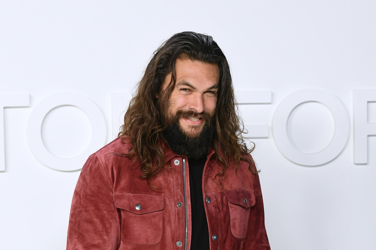 Jason Momoa in a red shirt. 