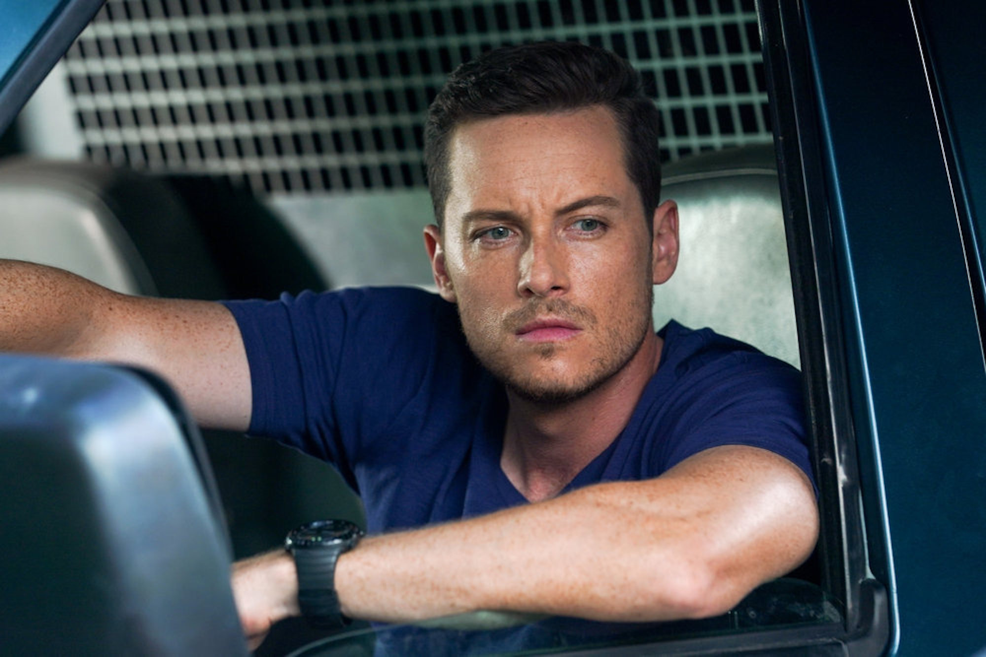 Jay Halstead sitting in a car in 'Chicago P.D.' Season 9