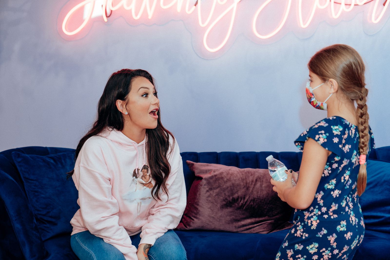 Jenni 'JWoww' Farley chats with a young fan at her Heavenly Flower store event on Sept. 22, 2021