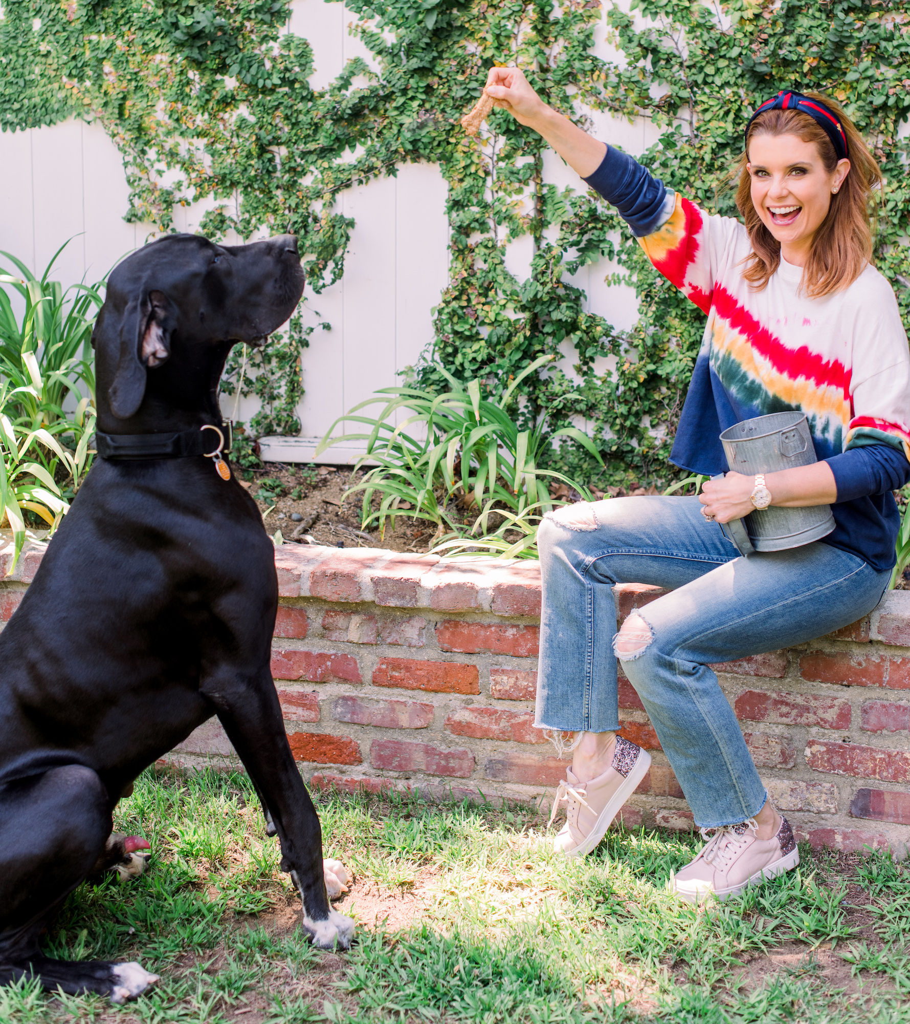 JoAnna Garcia Swisher offers Romeo a treat