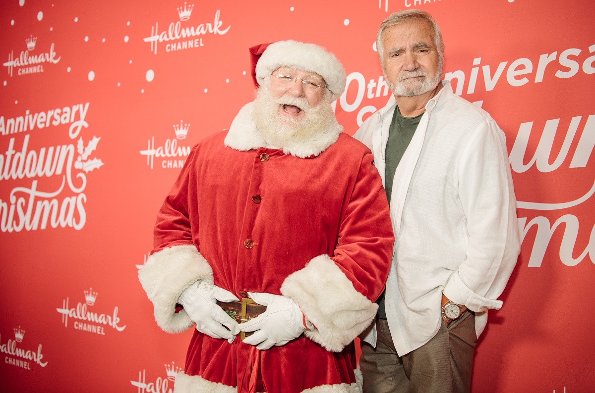 'The Bold and the Beautiful' actor John McCook poses with Santa Claus on the red carpet for the premiere of the Hallmark Channel movie 'A Christmas Love Story.'