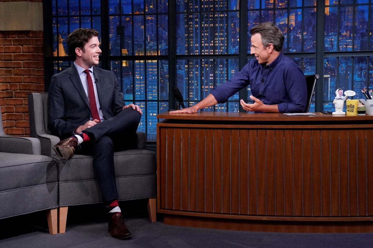 John Mulaney and Seth Meyers smiling