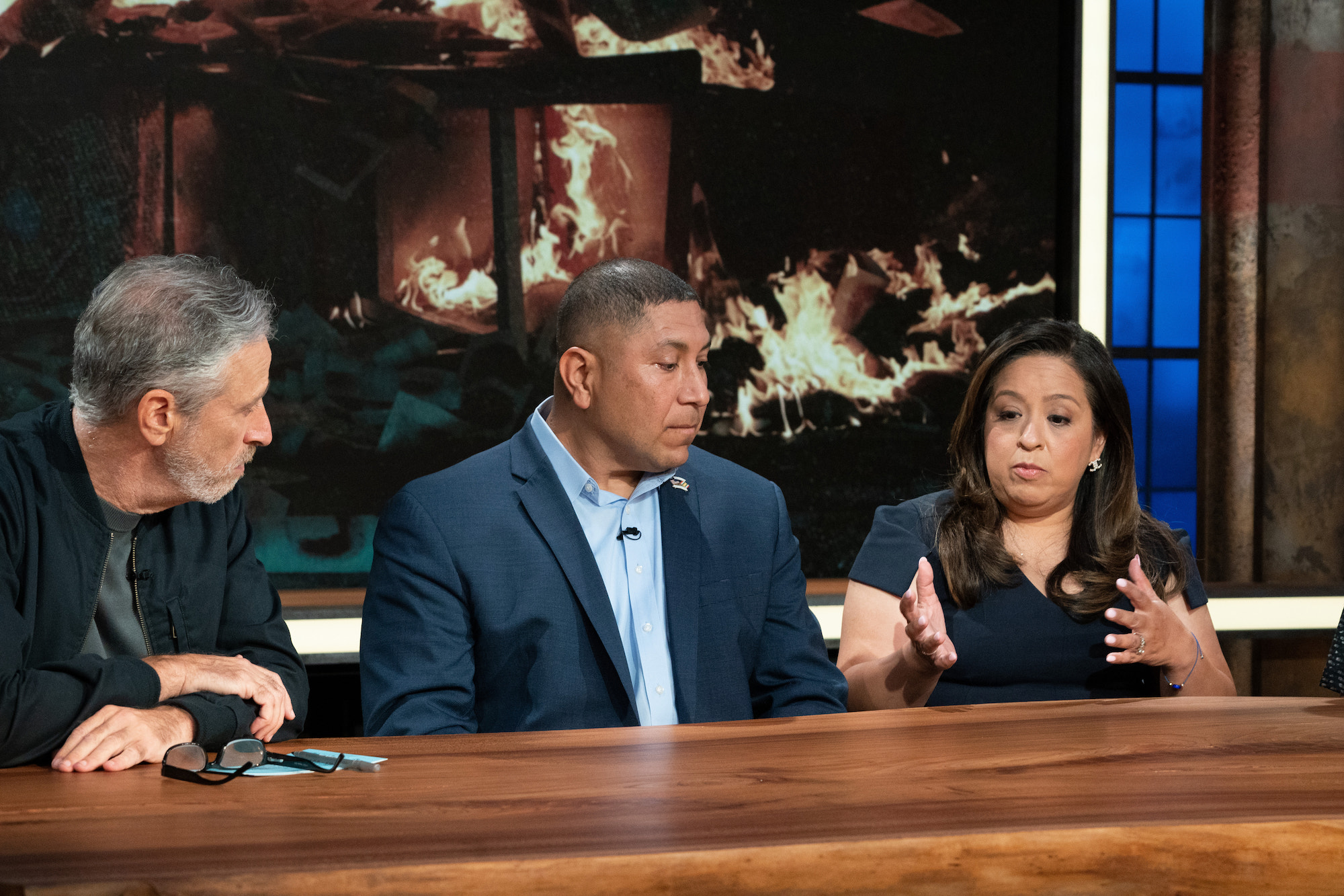 Jon Stewart speaks to Capt. LeRoy Torres and Rosie Torres
