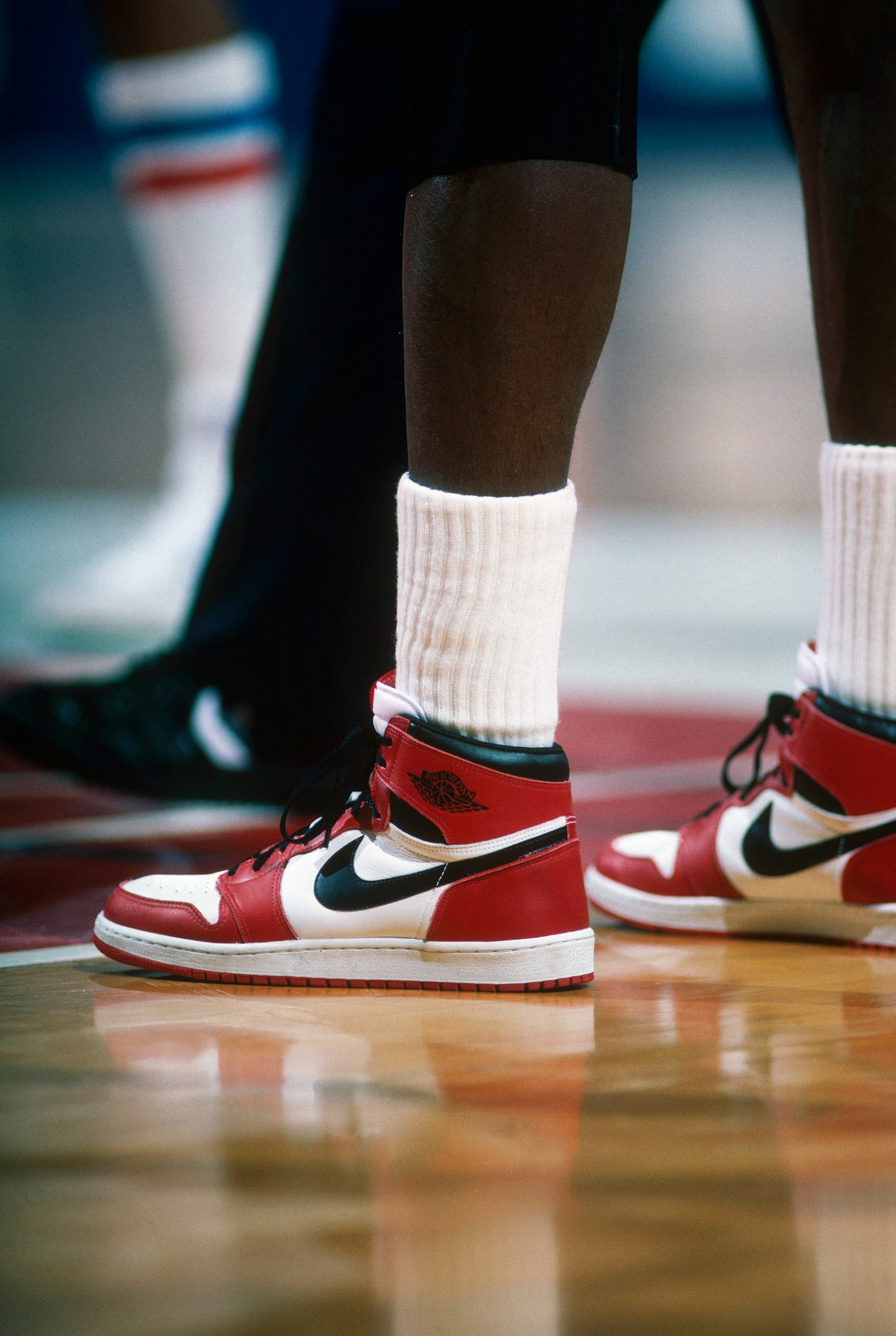 Michael Jordan wears his signature sneakers, the Jordan 1 during a game against the Washington Bullets in 1985