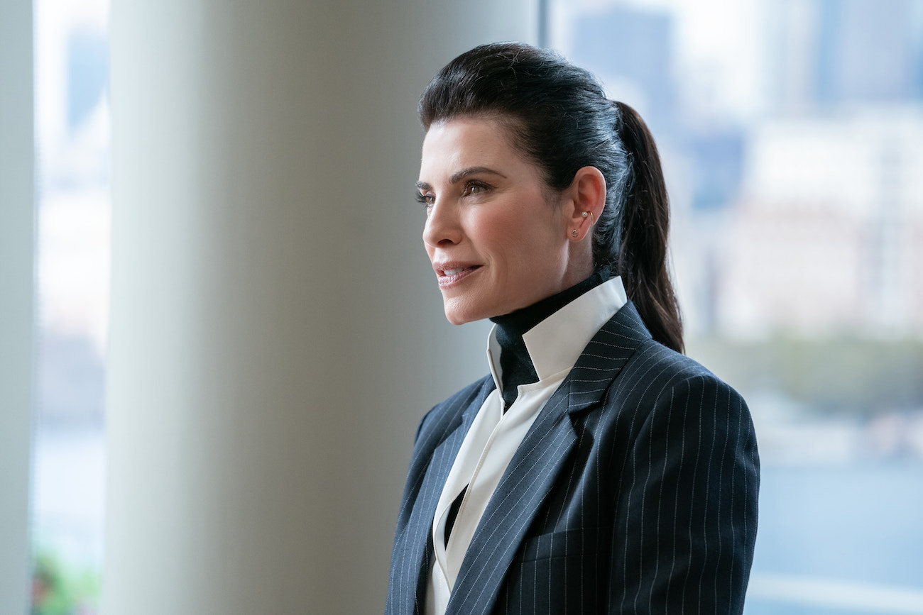 Julianna Margulies wears a striped blazer and looks on in 'The Morning Show' Season 2