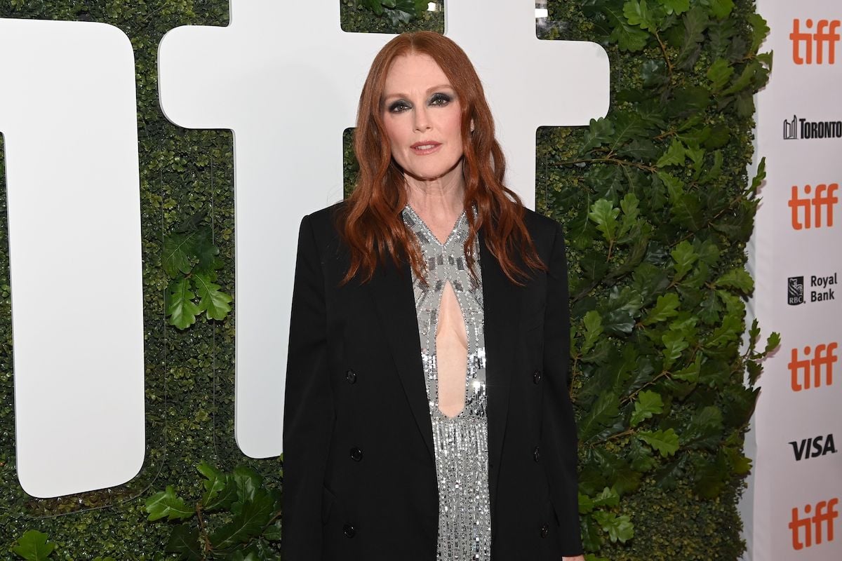 Julianne Moore in black coat at Dear Evan Hansen premiere. 