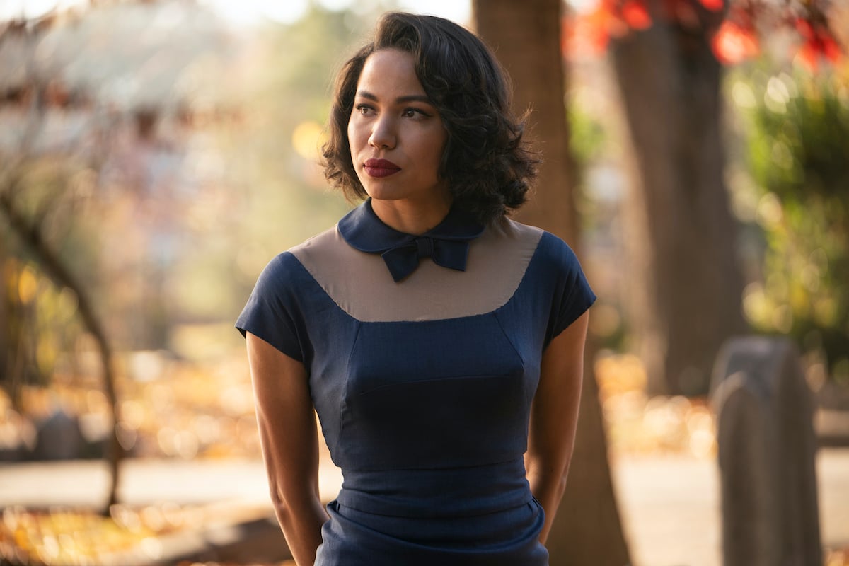 Jurnee Smollett wearing a blue dress in 'Lovecraft Country.'