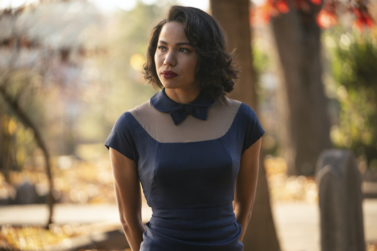 Jurnee Smollett wearing a blue dress in 'Lovecraft Country.'