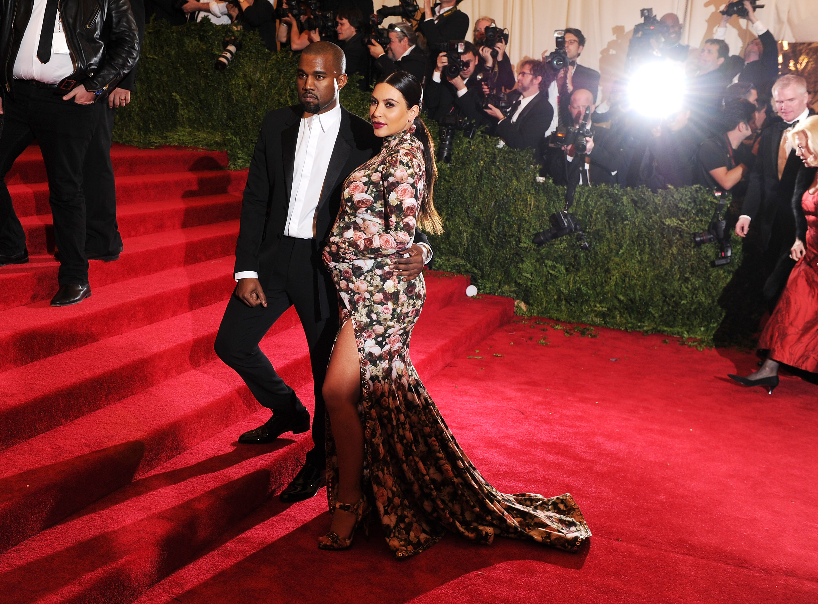 Kanye West and Kim Kardashian West posing at the 2013 Met Gala.