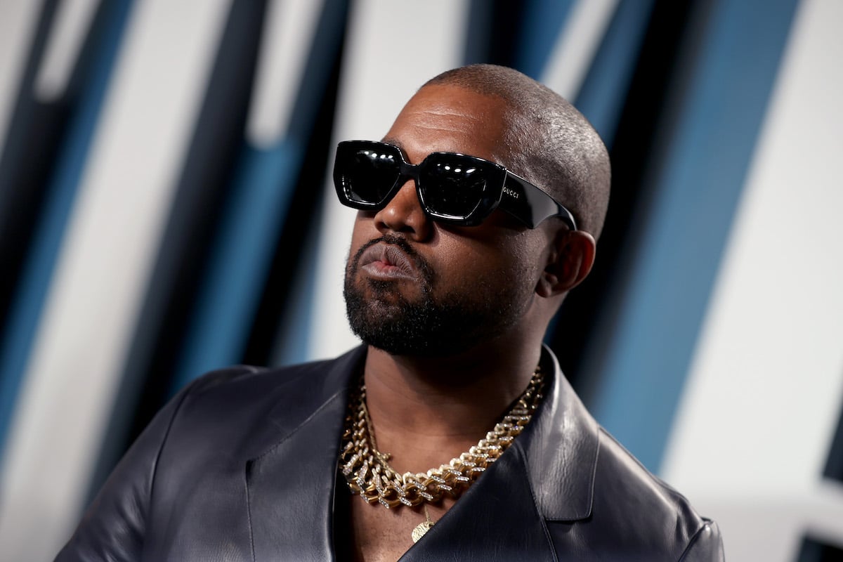 Kanye West wear black shades and dark glasses as he attends the 2020 Vanity Fair Oscar Party hosted by Radhika Jones at Wallis Annenberg Center for the Performing Arts on February 09, 2020 in Beverly Hills, California.
