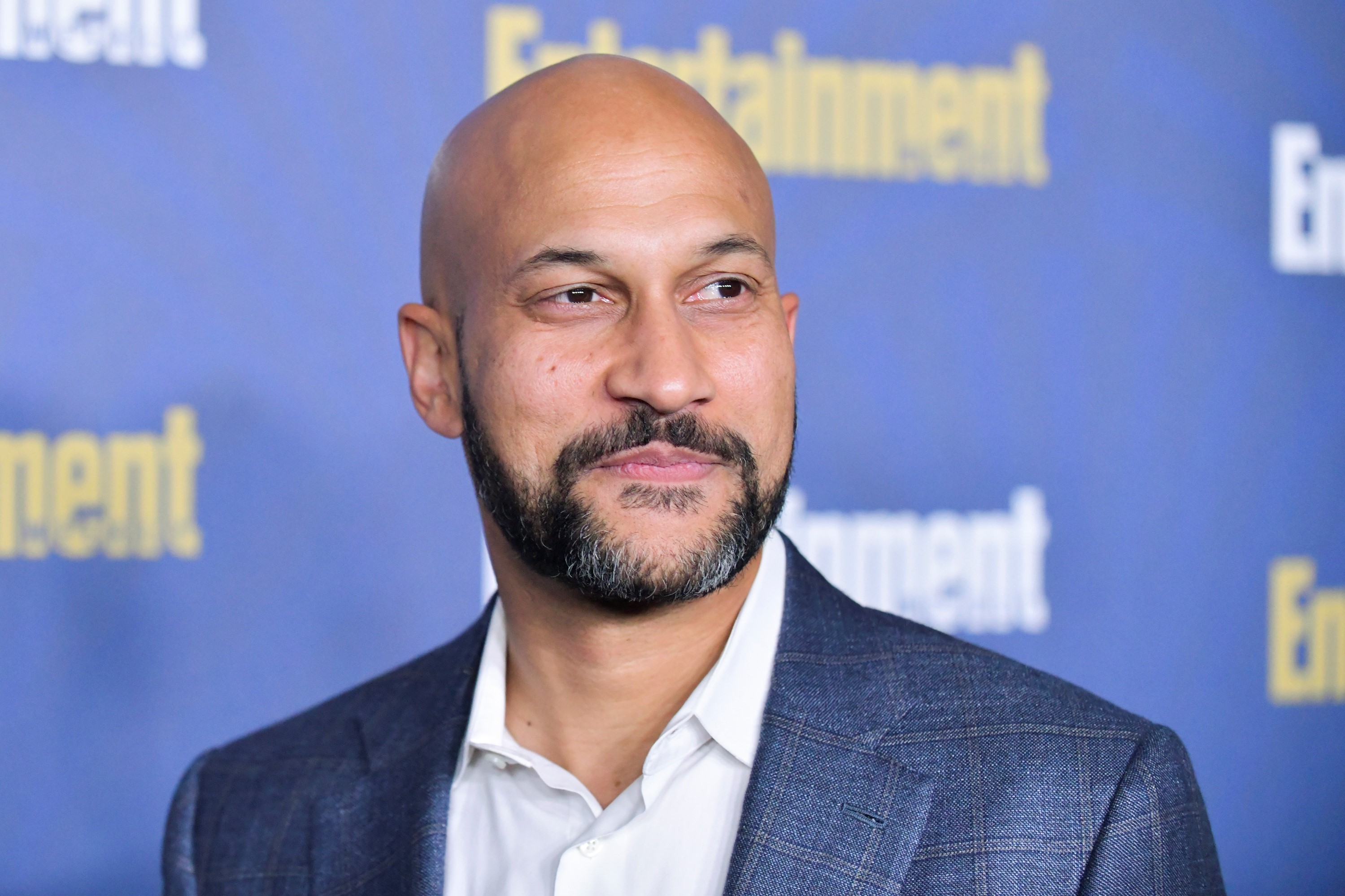 Keegan-Michael Key, in a blue jacket and white shirt, at the Entertainment Weekly Pre-SAG celebration in 2020.