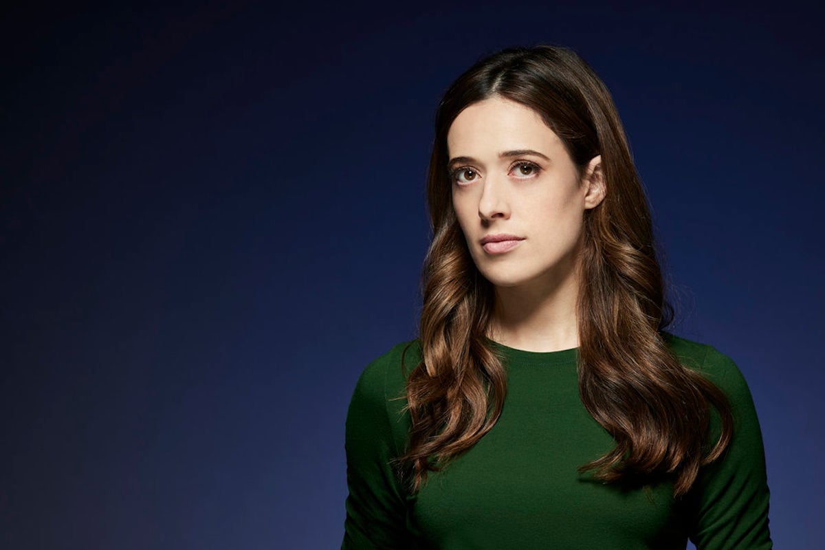 Kim Burgess, a member of the 'Chicago P.D.' Season 9 cast, against a dark blue background. 'Chicago P.D.' Season 9 spoilers suggest Kim Burgess is in for a rough recovery.