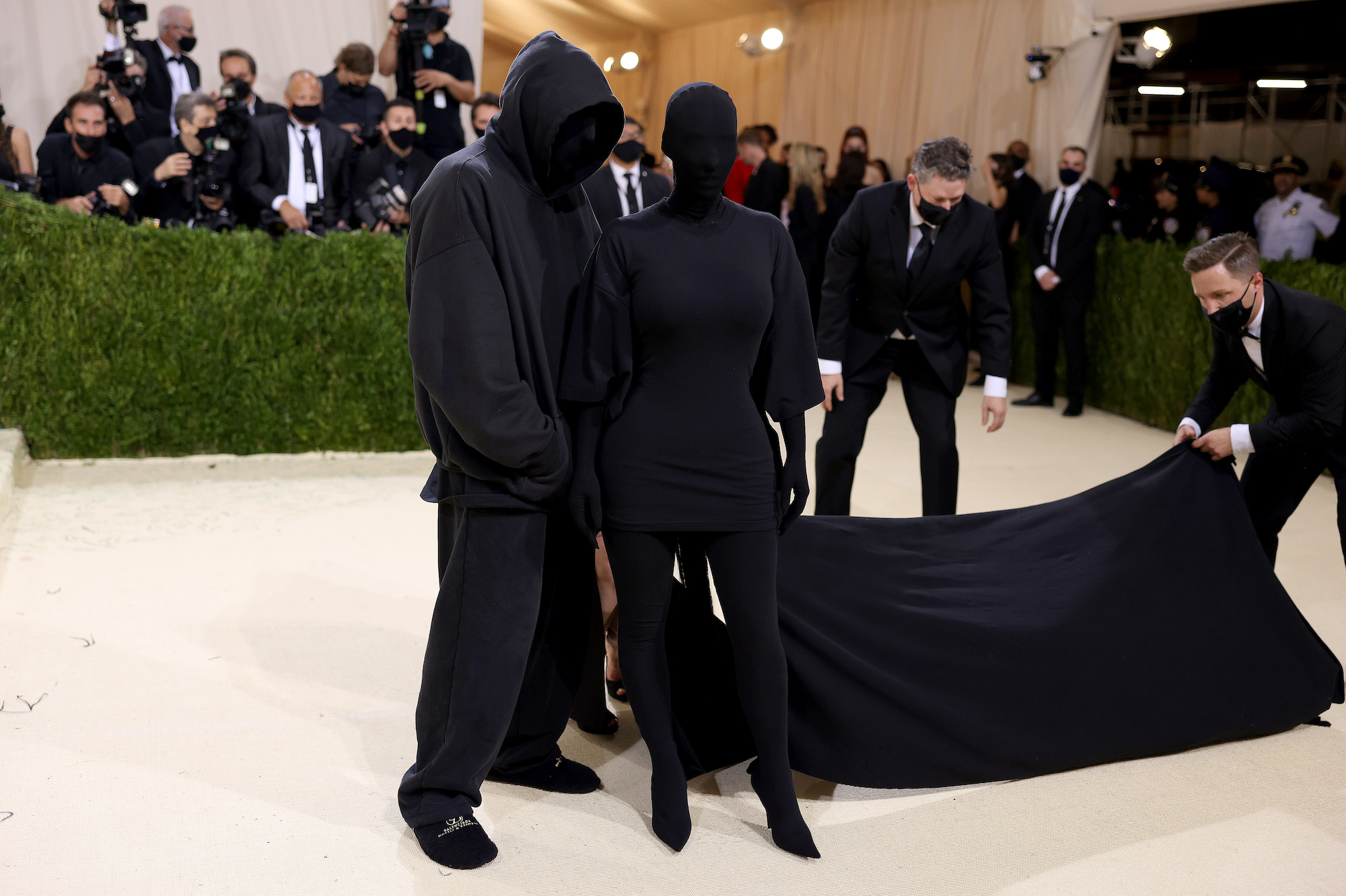 Kim Kardashian West and Demna Gvasalia, the creative director of Balenciaga, posing on the red carpet at the 2021 Met Gala 
