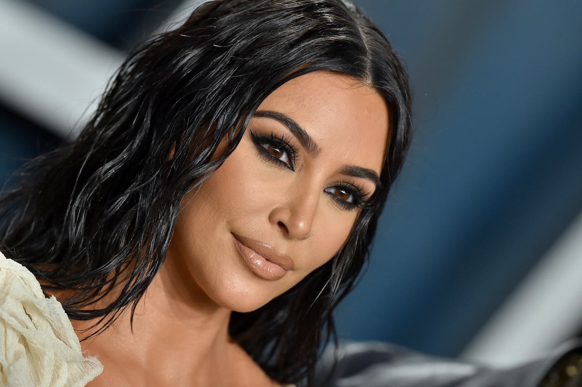 Close-up on Kim Kardashian West's face while she poses at an event.