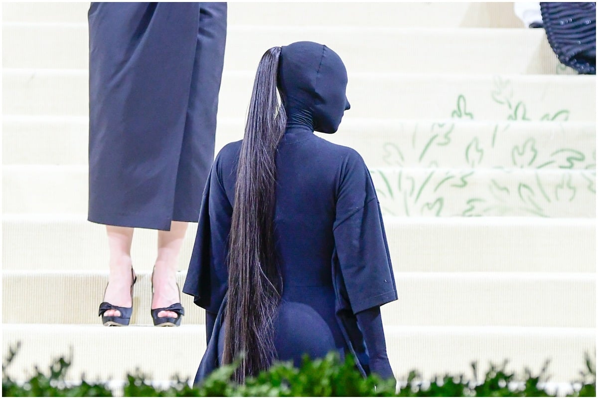 Kim Kardashian West attending The Met Gala 2021 wearing an all-black Balenciaga outfit.