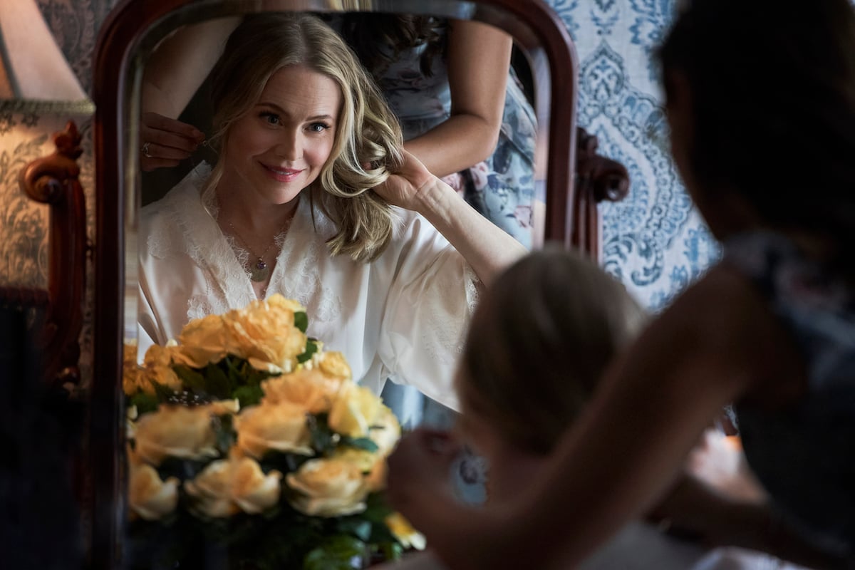 Kristin Booth as Shane, looking in a mirror, in 'Signed, Sealed, Delivered: The Vows We Have Made'