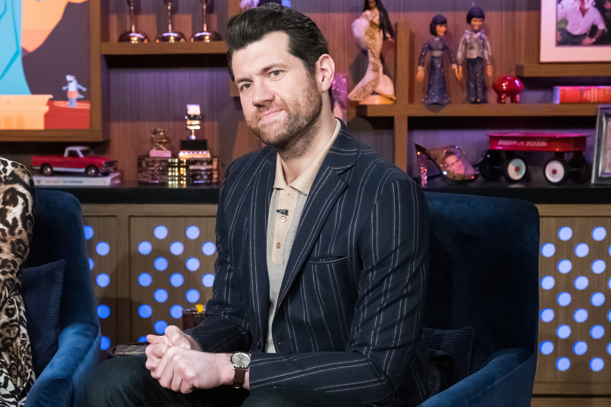 LGBTQ film 'Bros' star Billy Eichner sitting on a chair on 'Watch What Happens Live With Andy Cohen'