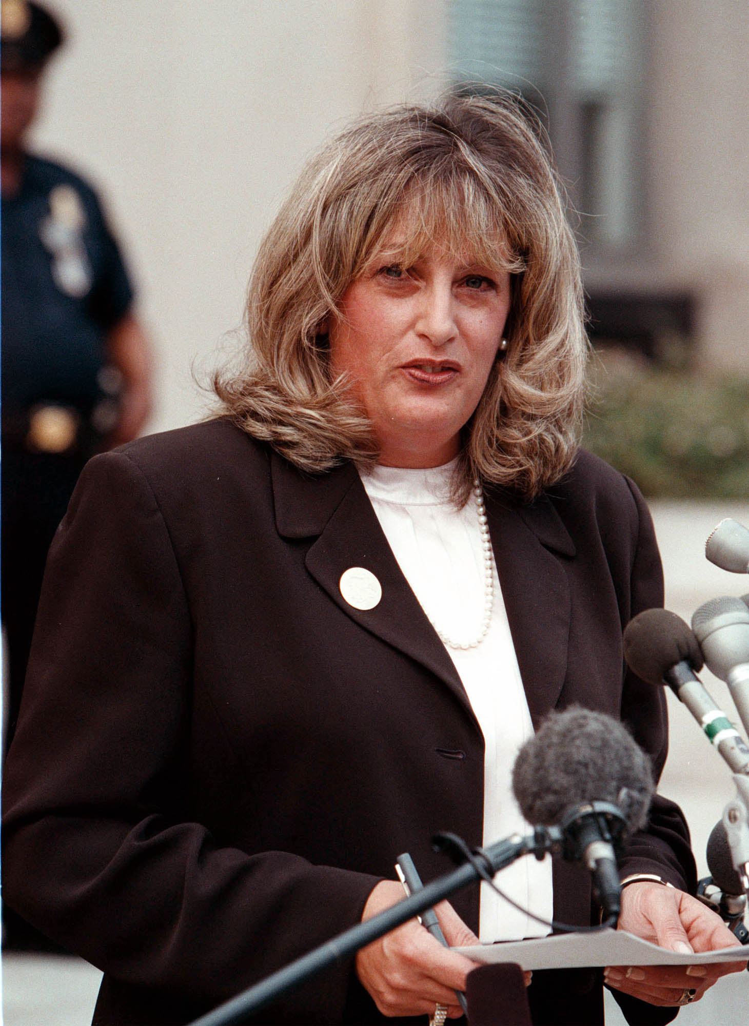 Linda Tripp speaking to the press outside the Federal Courthouse on July 29, 1998