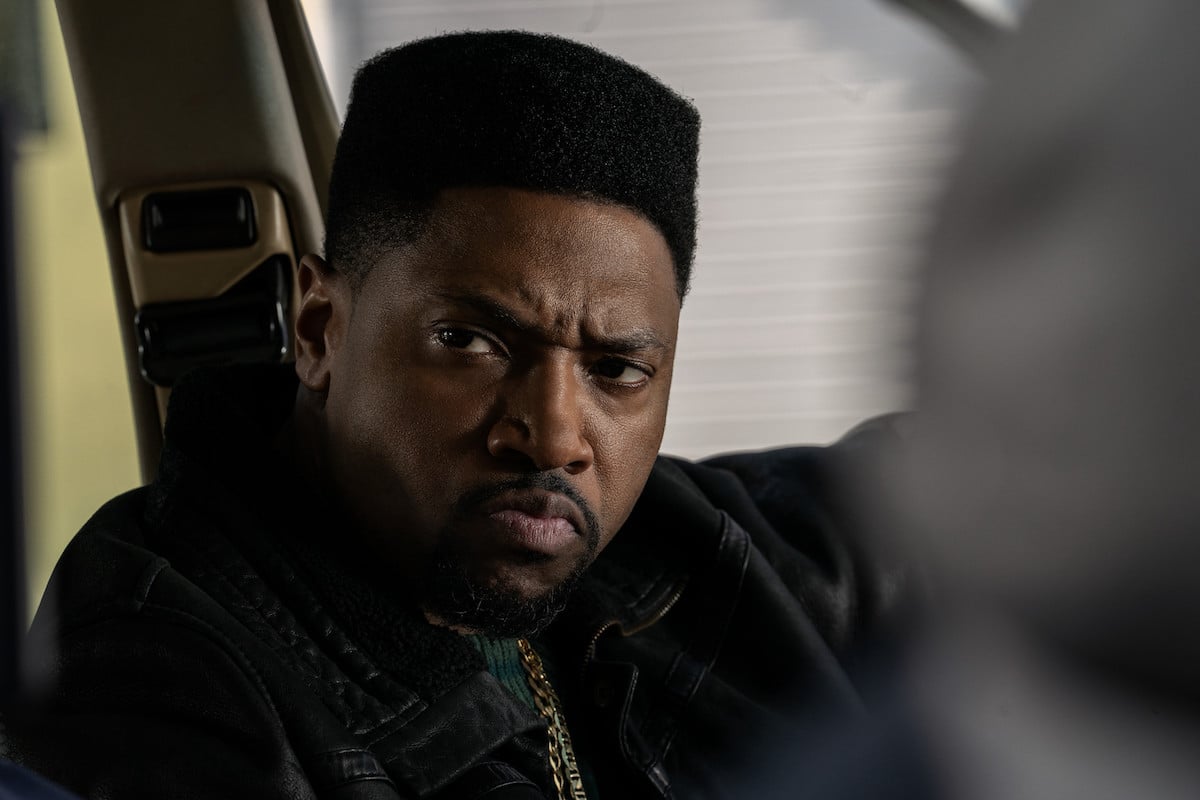 London Brown frowns in a car as Marvin Thomas in 'Power Book III: Raising Kanan'