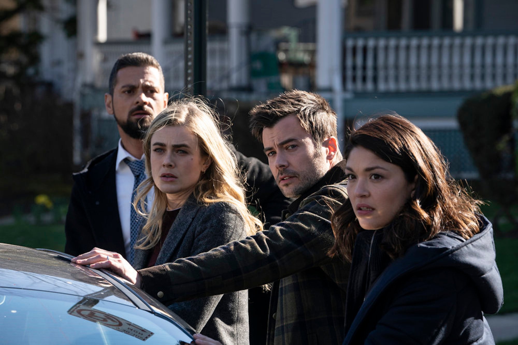 J.R Ramirez, Melissa Roxburgh, Matt Long, and Ellen Tamaki standing by a car in 'Manifest' Season 3