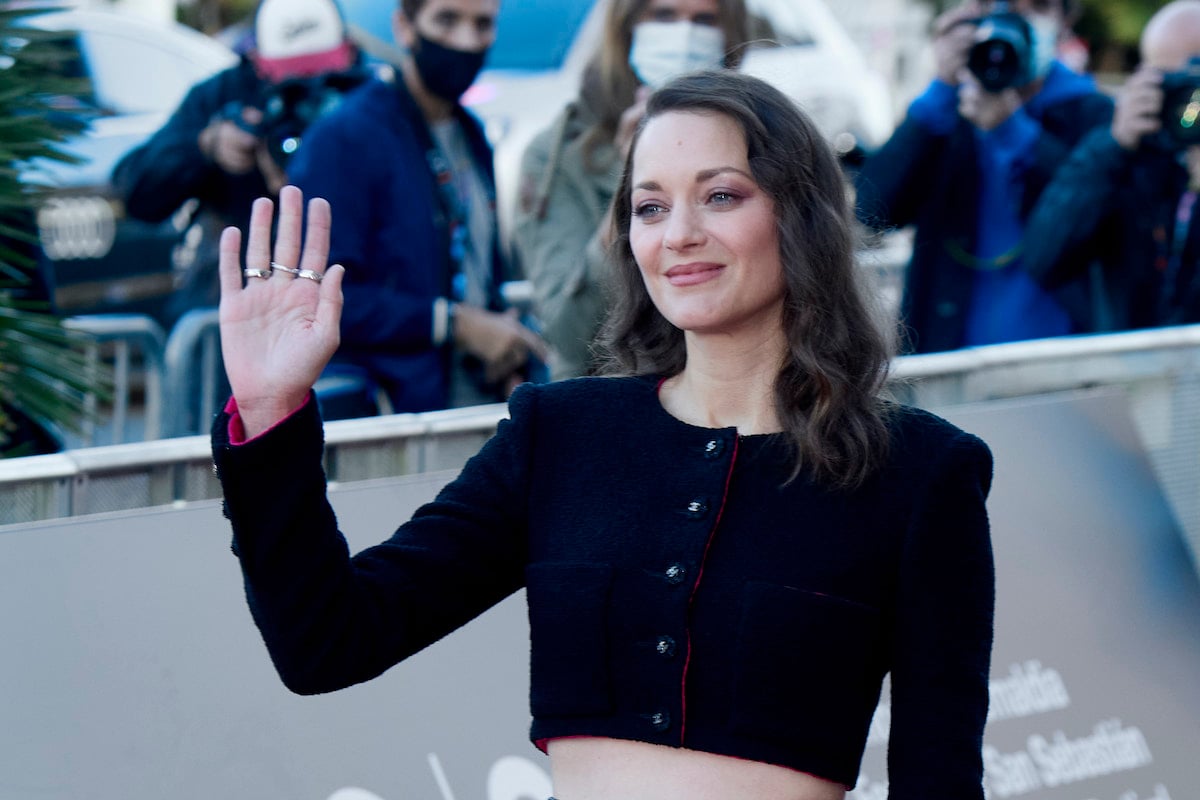 Marion Cotillard in a black pants suit