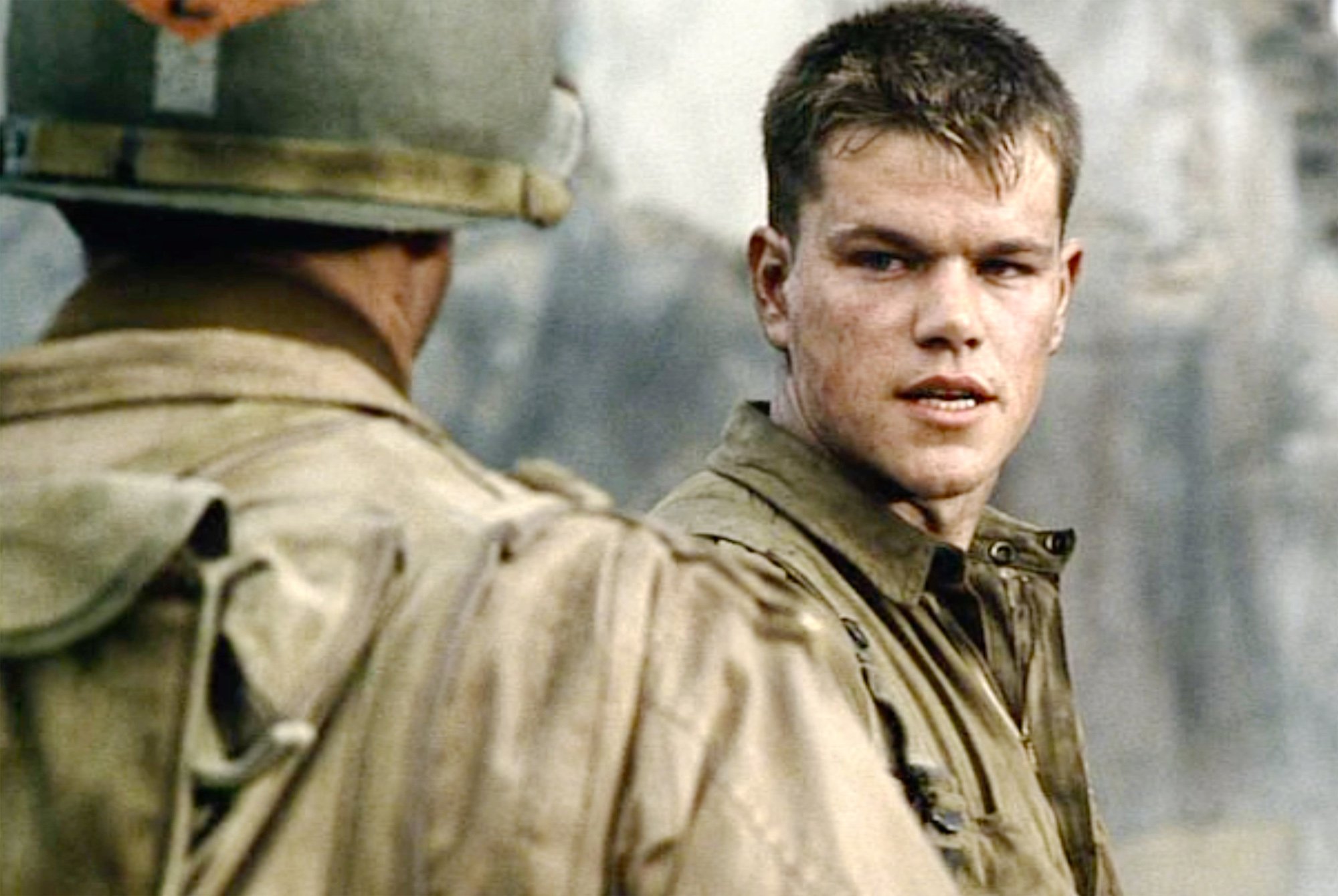 The movie "Saving Private Ryan", directed by Steven Spielberg. Seen here from left, Tom Hanks (as Captain John H. Miller, back to camera) and Matt Damon (as Private James Francis Ryan, of the 101st Airborne). 