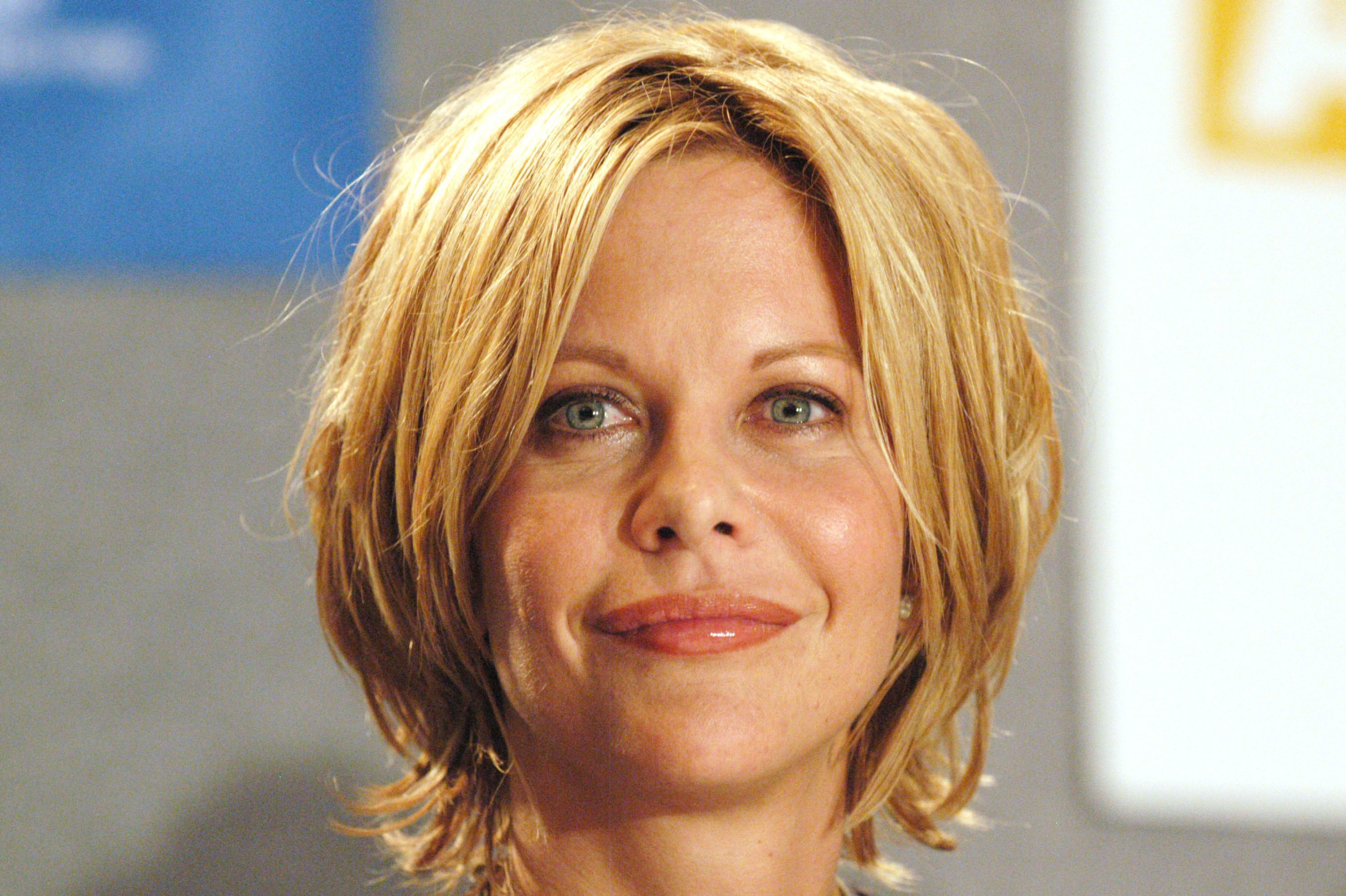 Meg Ryan in short hair at a press conference in 2003.