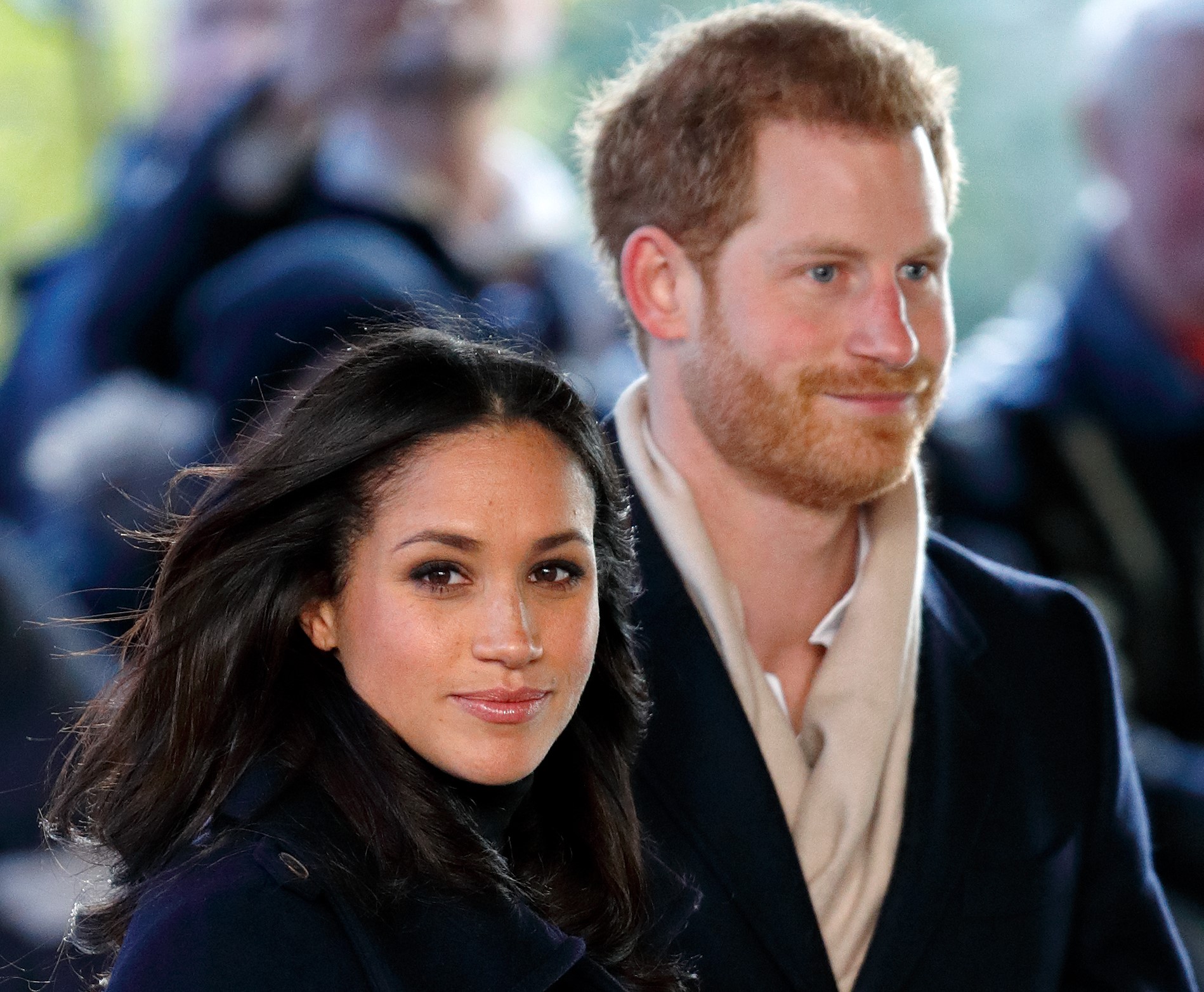 Meghan Markle and Prince Harry attending a World AIDS Day charity fair in 2018
