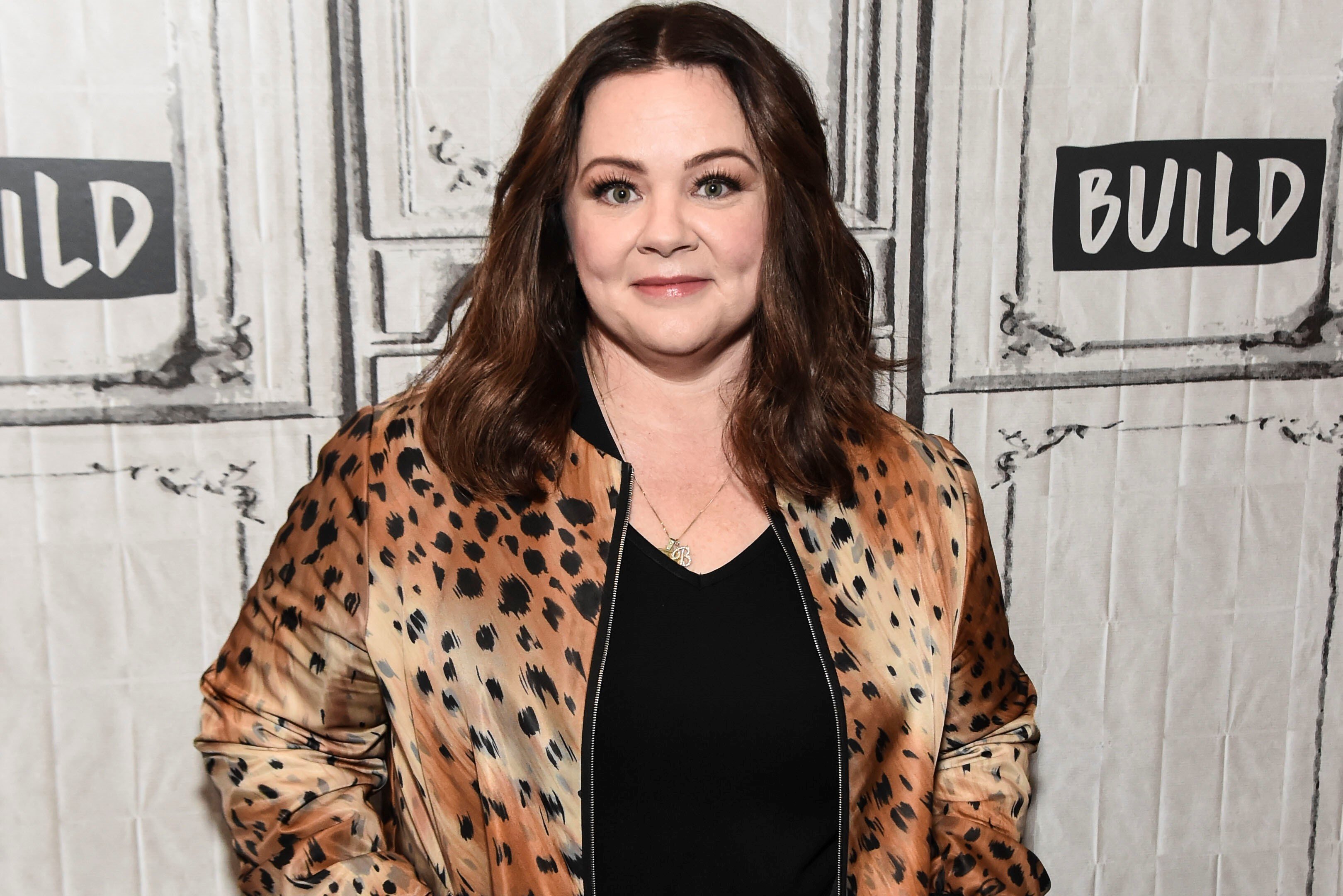 Melissa McCarthy, in a leopard print jacket and black tee, at the panel for her film 'Can You Ever Forgive Me?' in 2018.