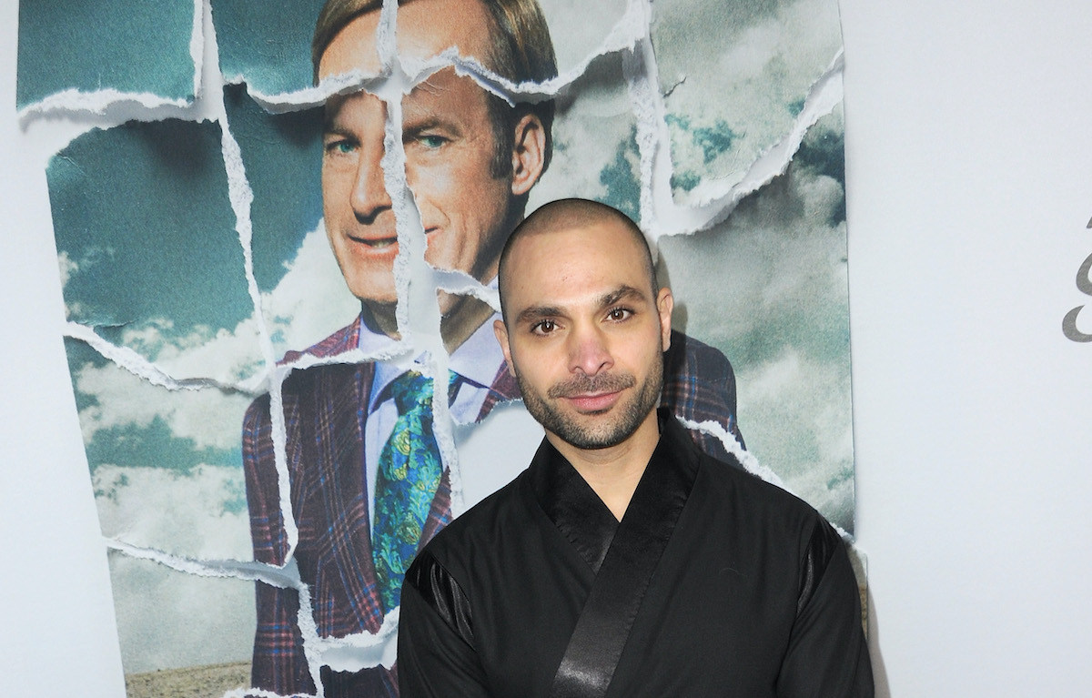 Michael Mando of 'Better Call Saul' wearing a black suit on the red carpet at an event for the show