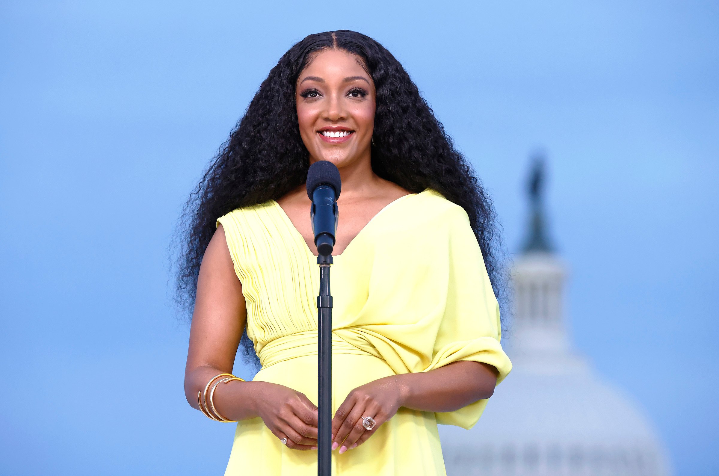 Country music star and Grammy-nominee Mickey Guyton performing the national anthem on stage at the Capital Concerts' "National Memorial Day Concert" in Washington, DC.