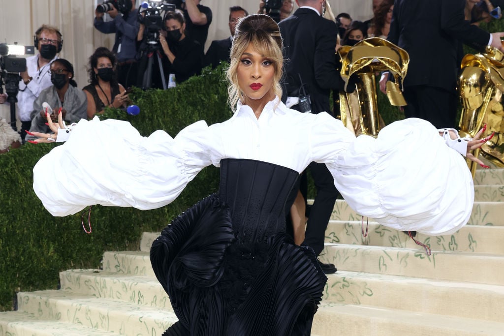 'Pose' Mj Rodriguez walks the Met Gala carpet in a stunning back and white dress with big, puffy white sleeves. 
